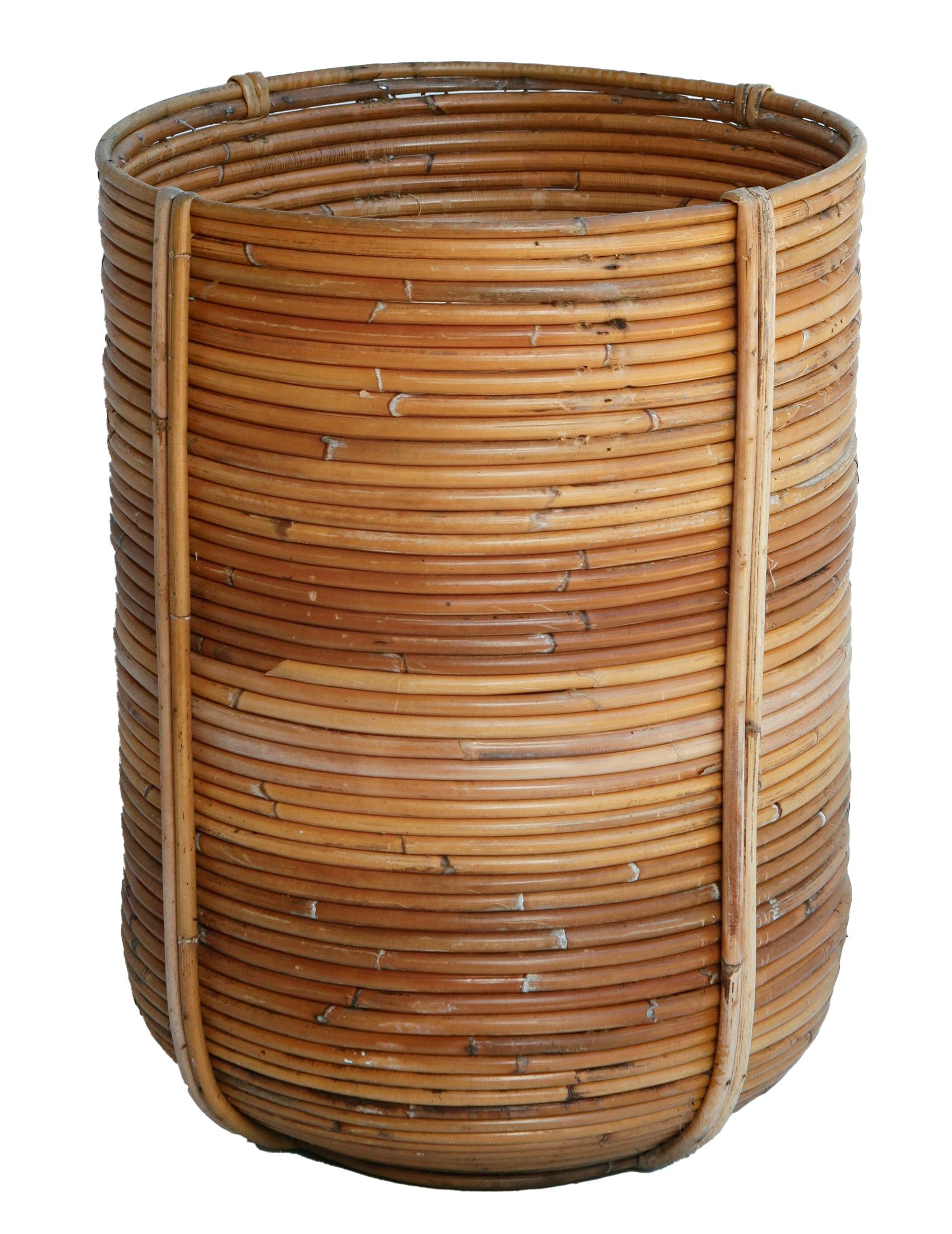 Handmade reed basket offers a timeless decorative accent with natural texture. Presumed to be crafted in the mid-late 20th century.
This basket is in very good vintage condition, great as a planer or catchall.
A versatile piece, the complements,