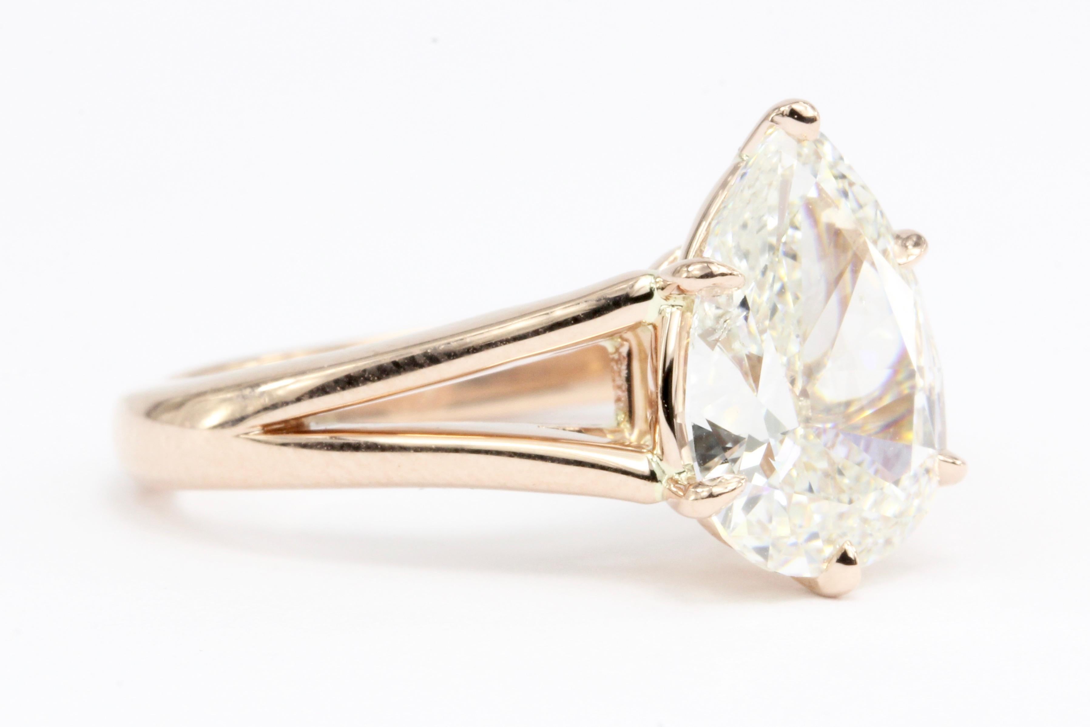 rose gold pear shaped engagement ring