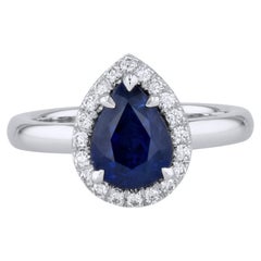 Bague en platine faite à la main, saphir bleu royal en forme de poire pavé de diamants