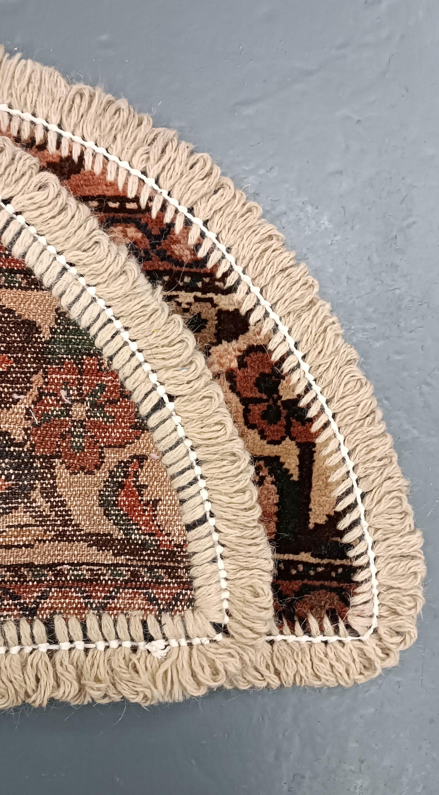 Handmade carpet Oriental rug featuring a traditional floral pattern woven in deep rich tones created by organic vegetable dyes on lamb wool, this little mat is perfect for any modern or traditional home doorway. This semi-circle entranceway doormat