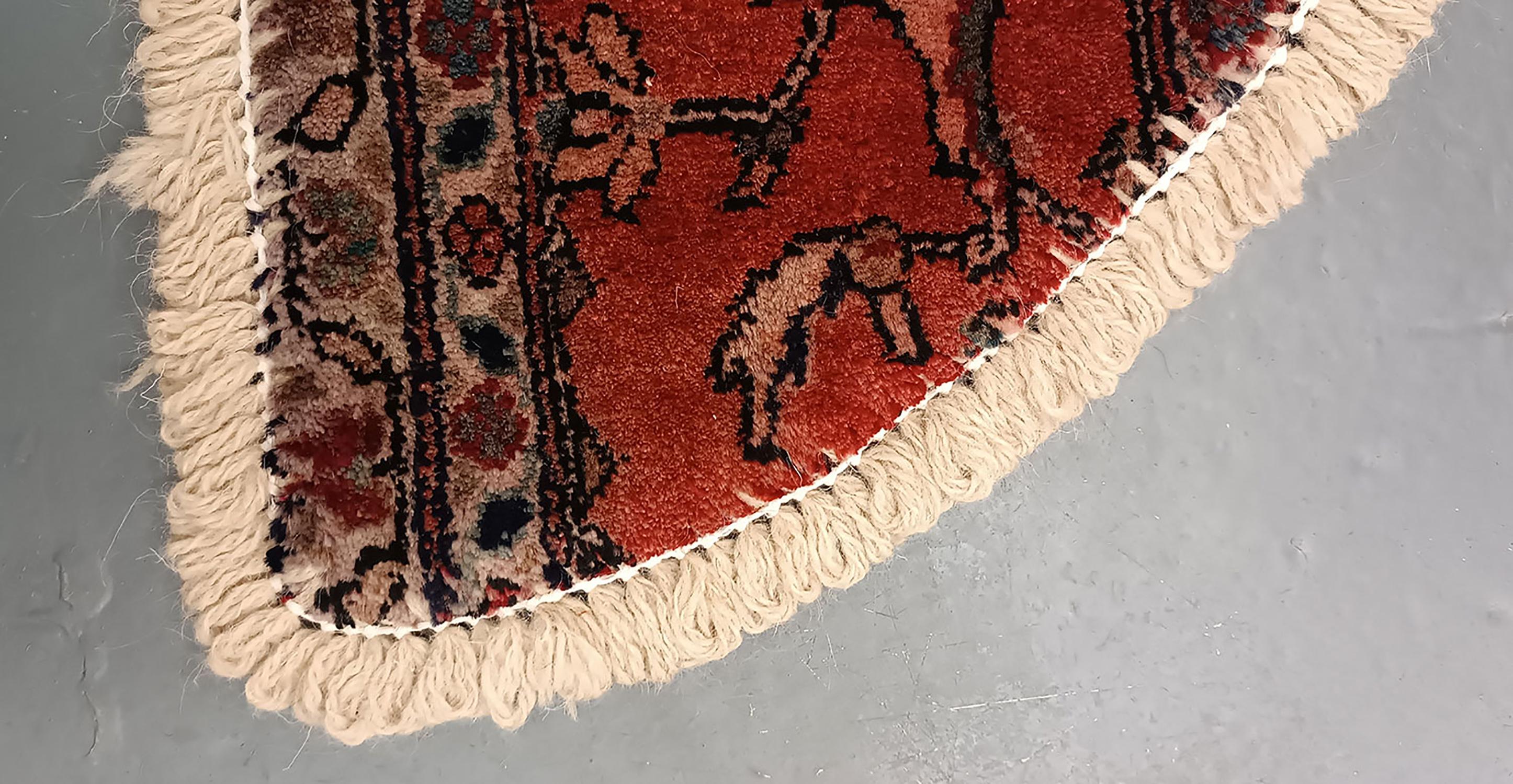 Handmade carpet Oriental rug featuring a traditional floral pattern woven in deep rich tones created by organic vegetable dyes on lamb wool, this little mat is perfect for any modern or traditional home doorway. This semi-circle entranceway doormat