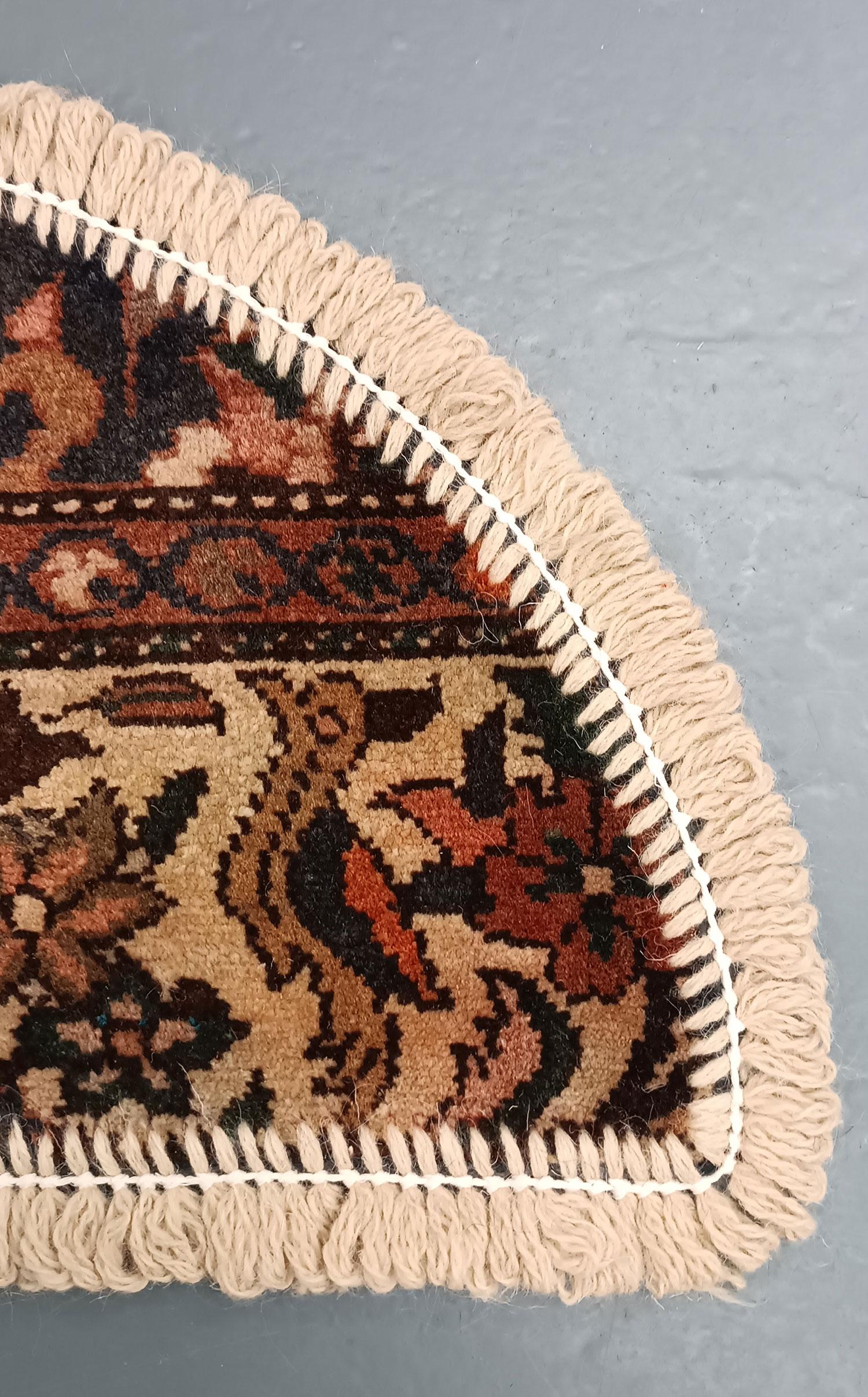 Handmade carpet Oriental rug featuring a traditional floral pattern woven in deep rich tones created by organic vegetable dyes on lamb wool, this little mat is perfect for any modern or traditional home doorway. This semi-circle entranceway doormat