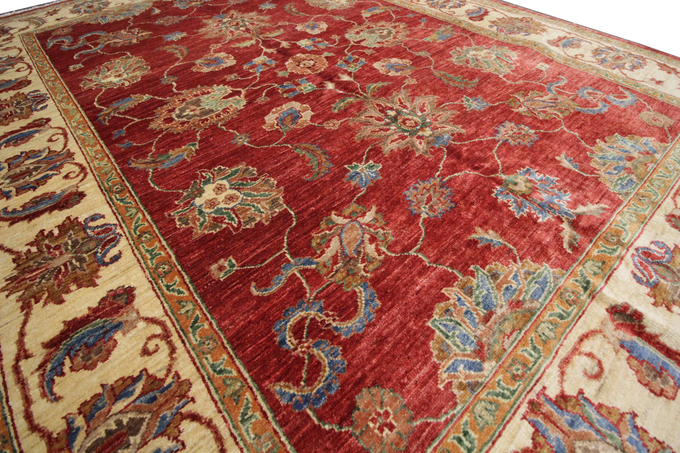 This traditional Zigler carpet had been handwoven and constructed with all-natural handspun and organic dyed wool. The subtle cream border contrasts with a deep red background which is centre stage to the stunning symmetrical, handwoven floral
