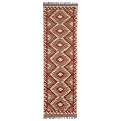 Tapis de couloir Kilim oriental vintage en laine rouge géométrique fait à la main