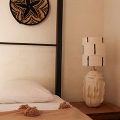 Handmade sculptural ceramic table lamp with textured shade, organic design