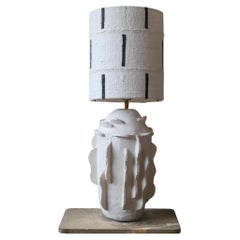 Handmade sculptural ceramic table lamp with textured shade, organic design
