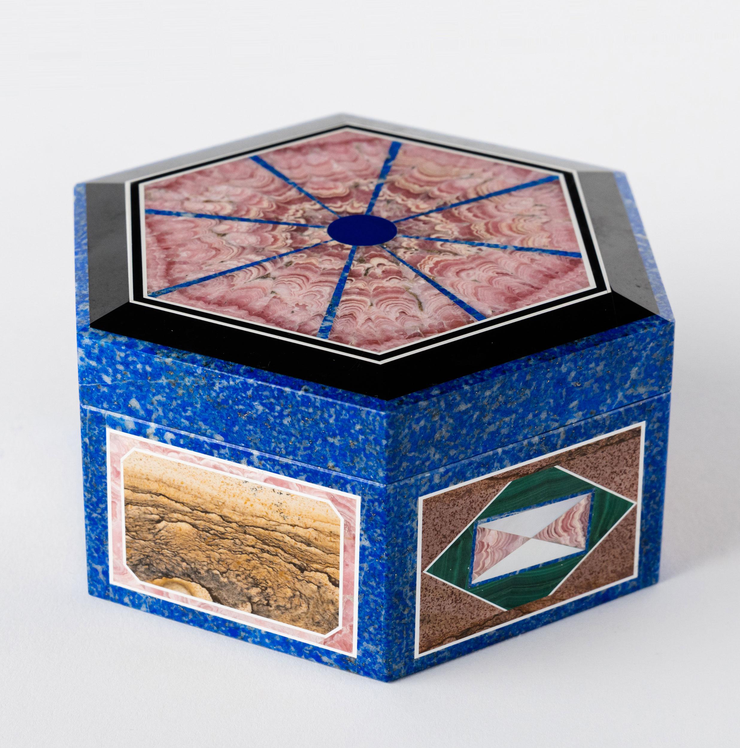 Magnificent & rare handmade semi precious stone intarsia jewelry box. This beautiful box was made out of Malachite, Petrified Wood, Lapis Lazuli, Mother Of Pearl, Black Onyx & Rhodonite. Russian, Circa 1950

Measures: D: 4-1/2