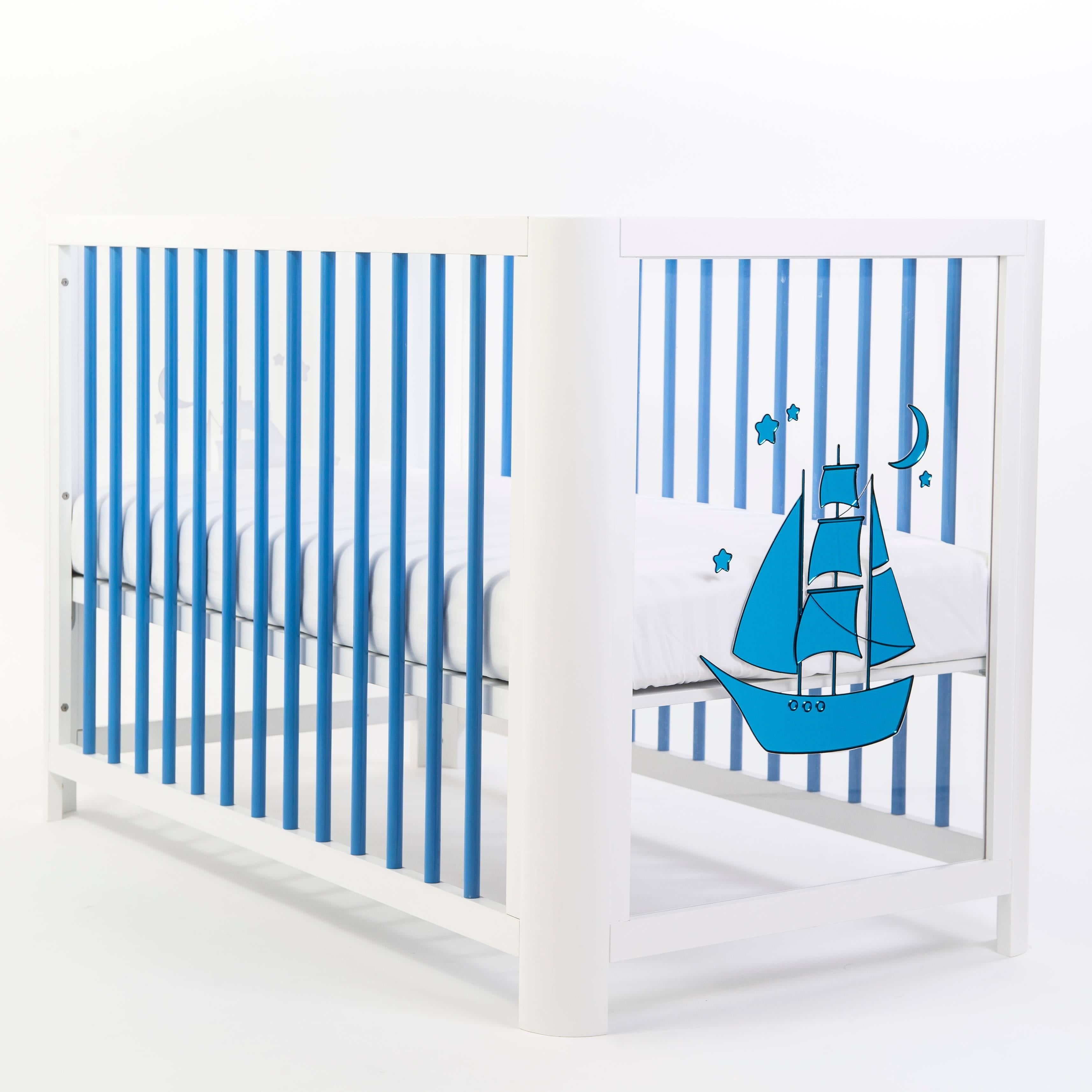 A new breath of air in the nursery that shines in mirrored blue, surrounded by a sea of clear and sparkling acrylic can let baby sea outside into the world and you to see inside into your world, and your heart. Built to last, built by hand. Converts