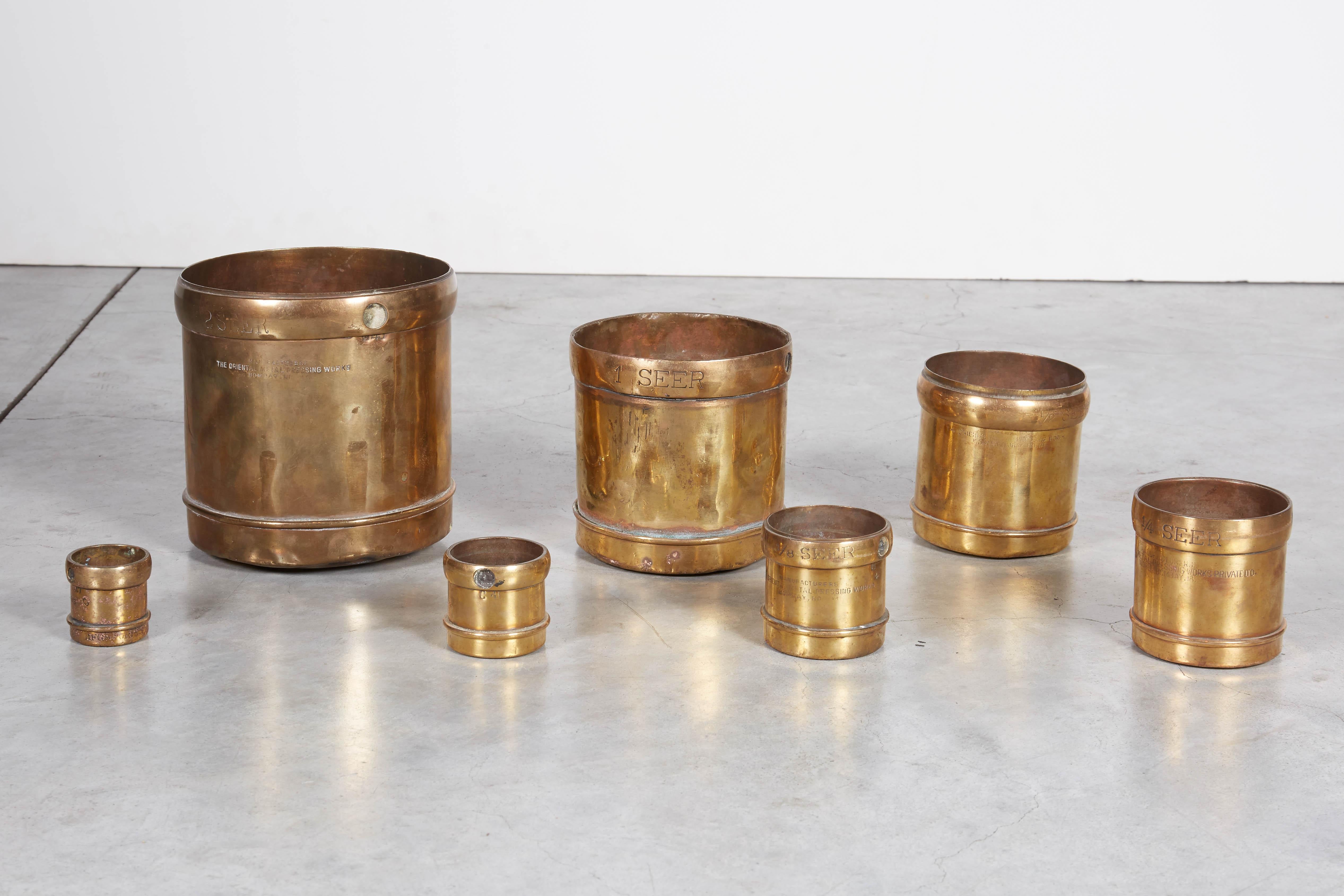 Handmade Set of 7 Engraved Brass Grain Measures, Midcentury, India In Good Condition In New York, NY