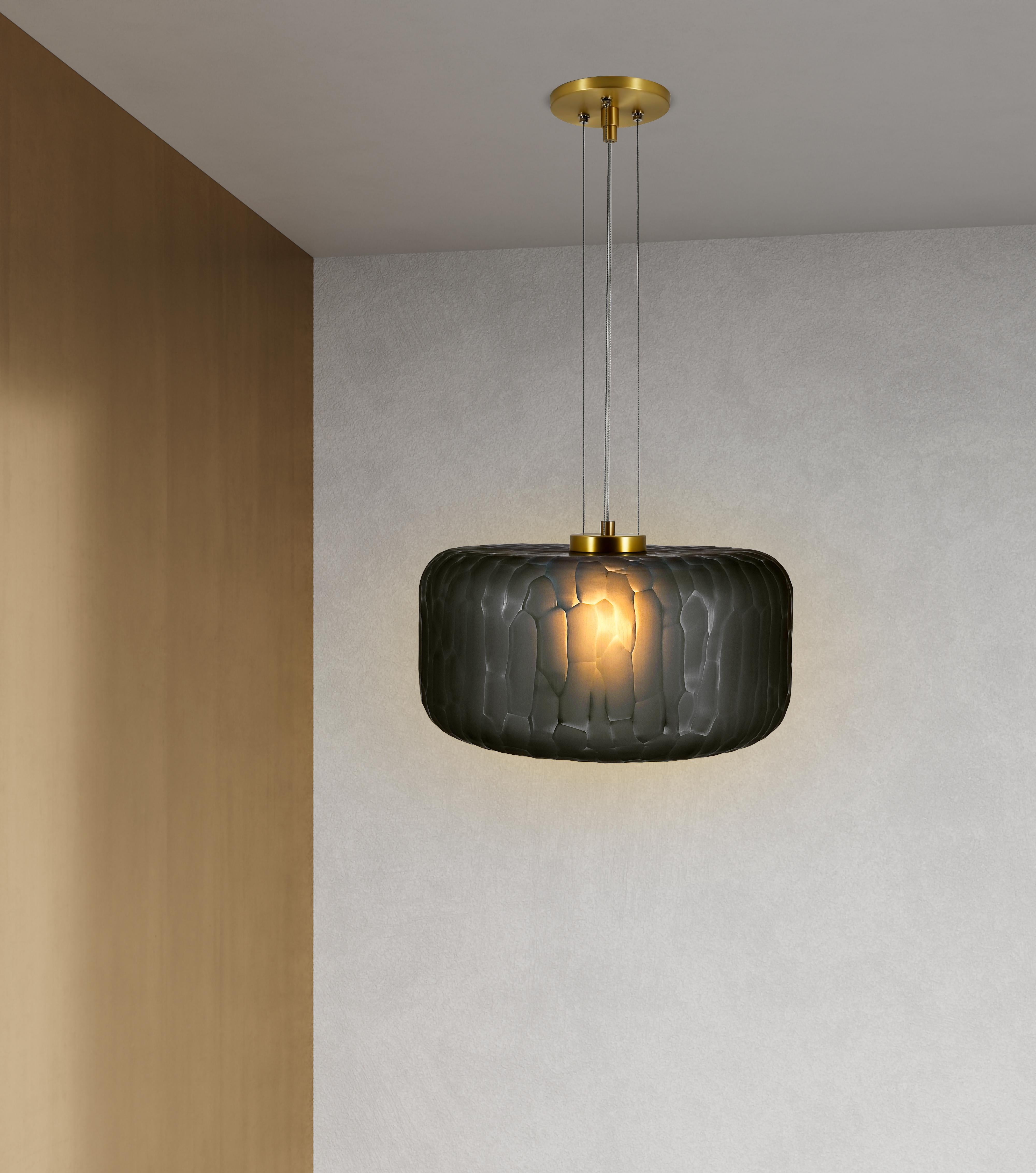 The Shereen Large pendant was designed with the expressive elegance of gemstone jewelry in mind. Bold, rounded contours with frosted, multifaceted surfaces create a remarkably exquisite sculptural piece with a rich, modern touch. Each piece is