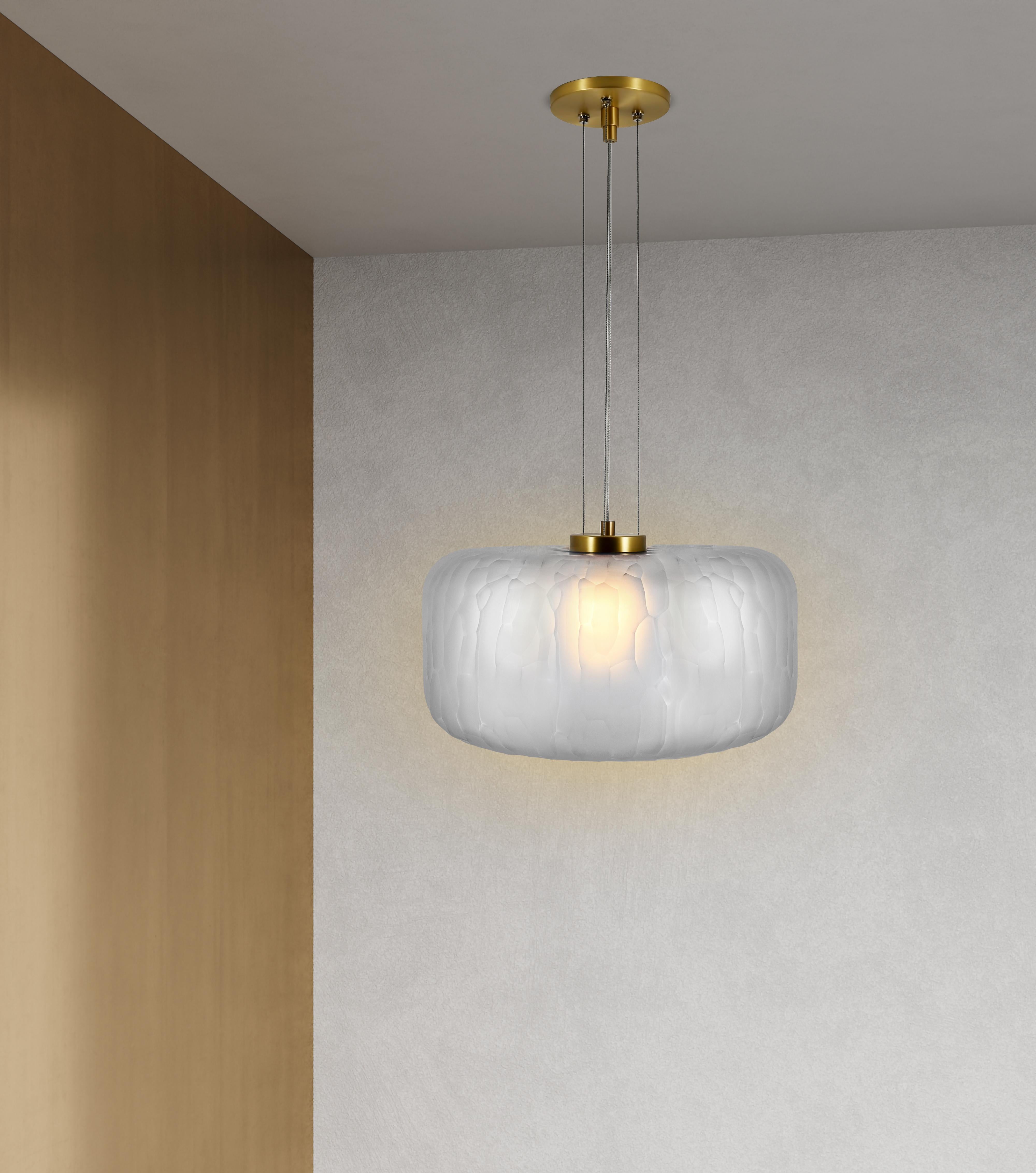The Shereen large pendant was designed with the expressive elegance of gemstone jewelry in mind. Bold, rounded contours with frosted, multifaceted surfaces create a remarkably exquisite sculptural piece with a rich, modern touch. Each piece is