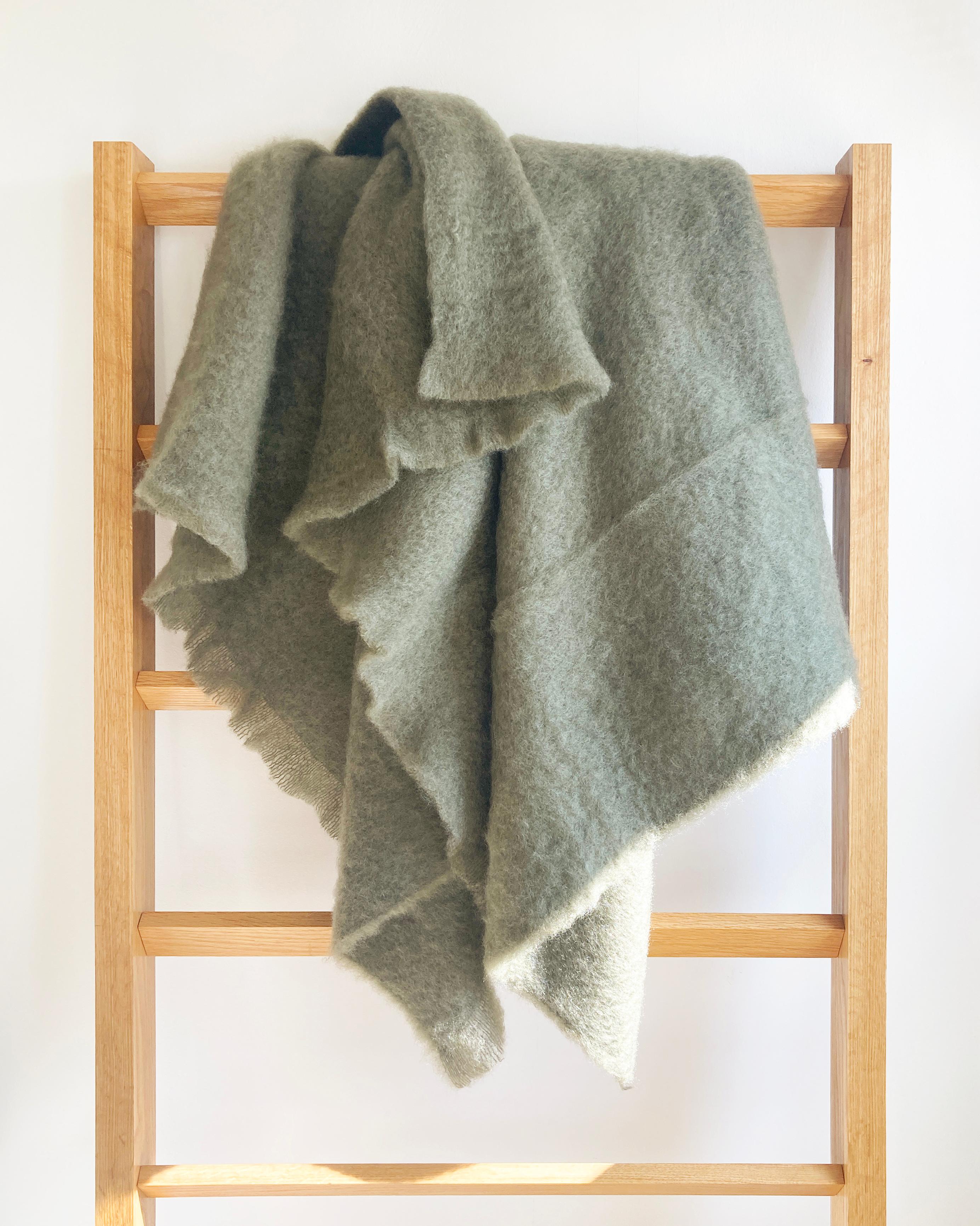 Cozy throw blankets for your home.

Mohair blankets will keep you cozy and warm this winter. When cold weather happens, wrap yourself up in this beautiful Moss green Mohair Throw and stay cozy. This understated green color will light up the room
