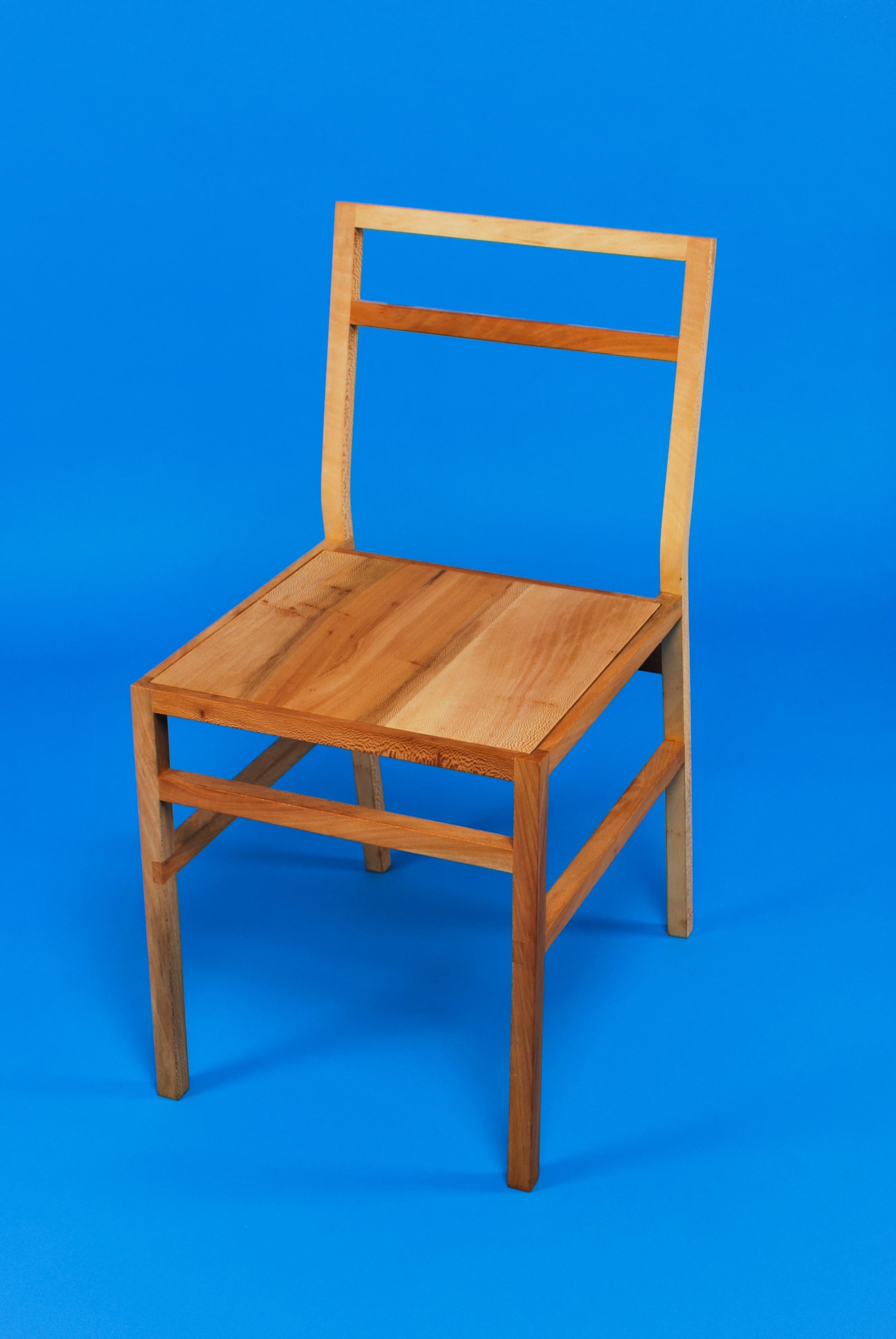 Minimalist Dining Chair. Created by Loose Fit and handmade to order in the UK. Available in a choice of three timbers - English Oak, Ash or London Plane.

Simple and delicate in appearance, yet comfortable and durable enough for everyday
