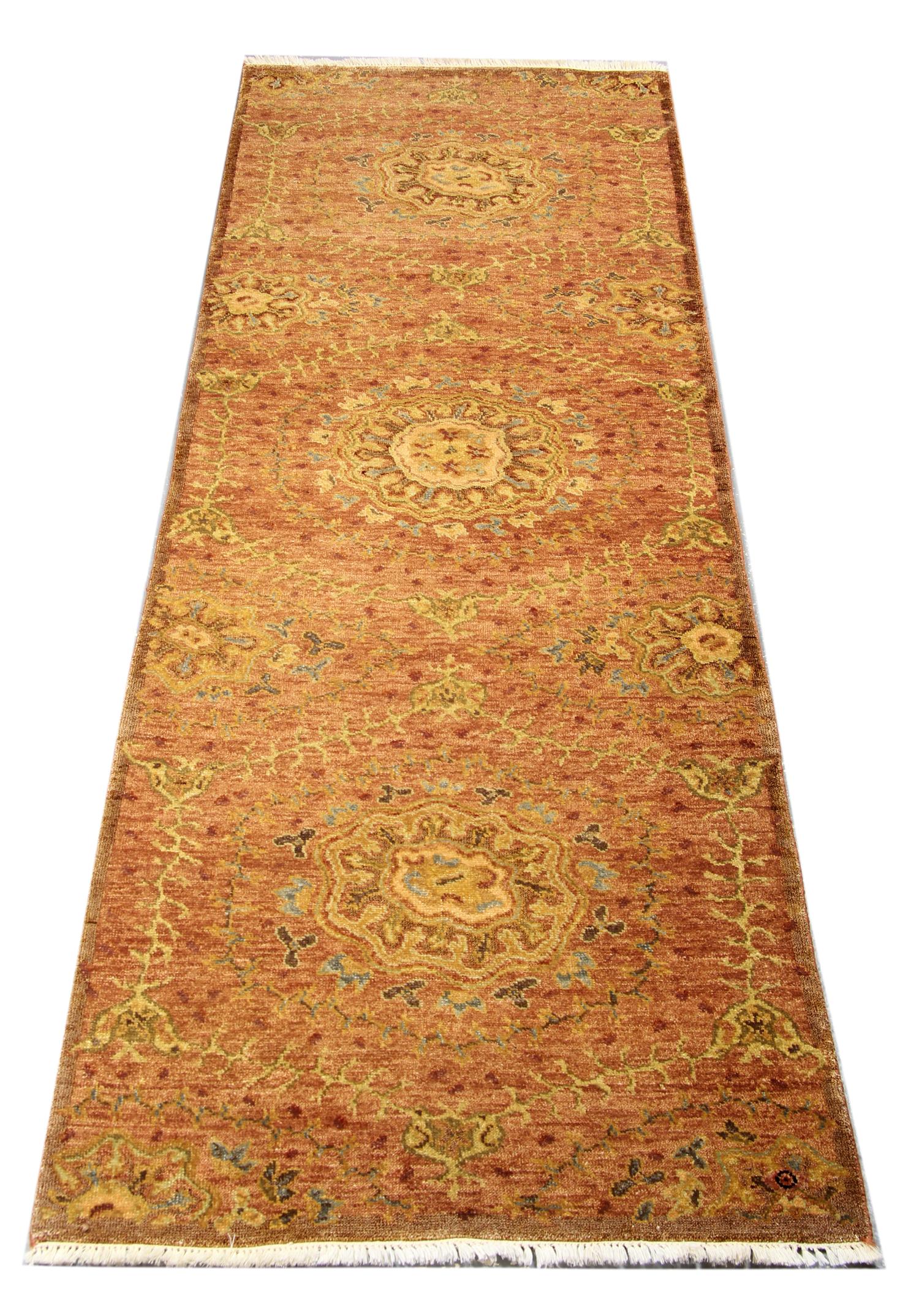 This truly unique wool rug features a fantastic all-over design woven with an elaborate Repeat pattern woven with a fantastic color palette. Yellow, pink, red and blue accents decorate the harmonious orange wool rug.
Constructed with the finest,