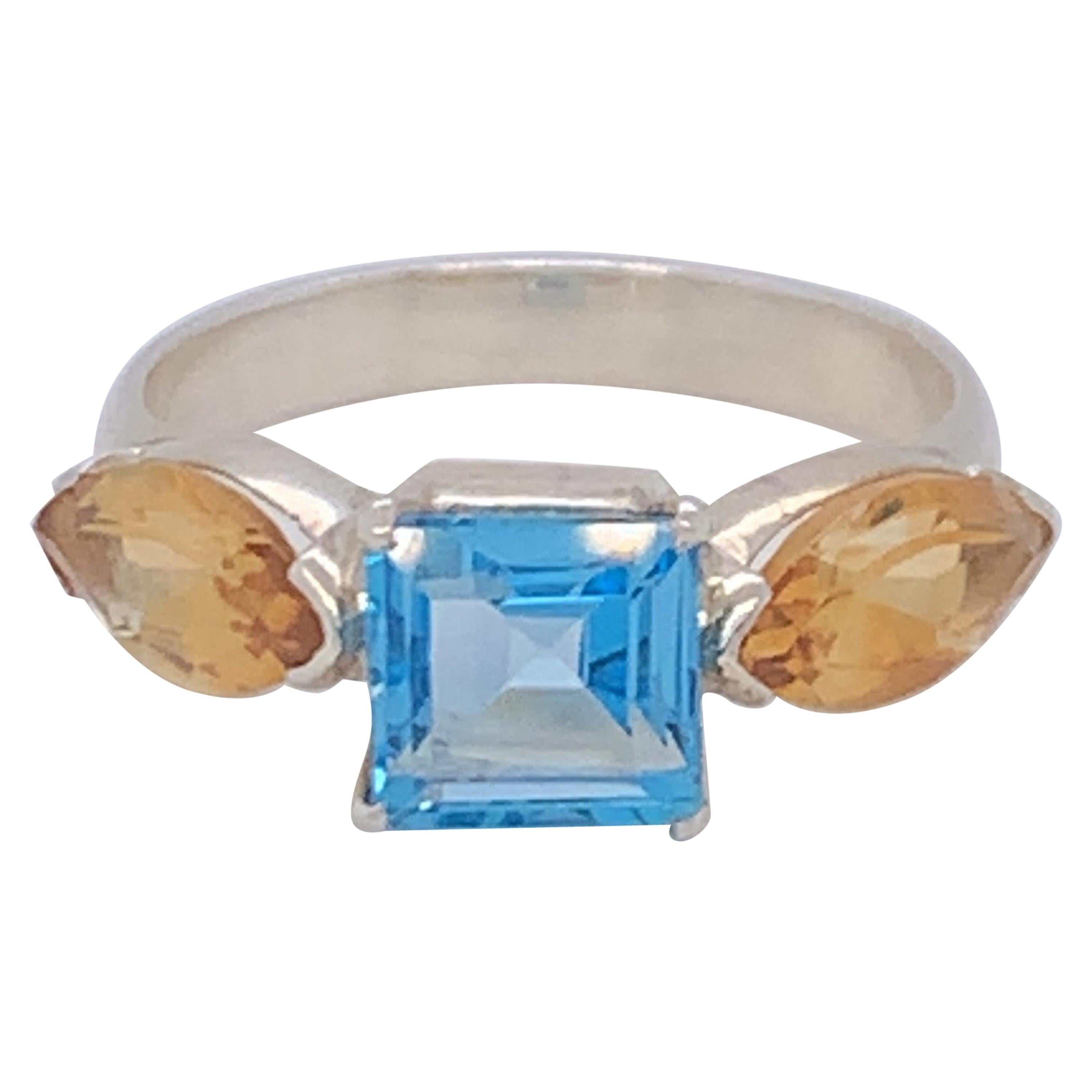 Handmade Sterling Silver Blue Topaz and Citrine Ring For Sale