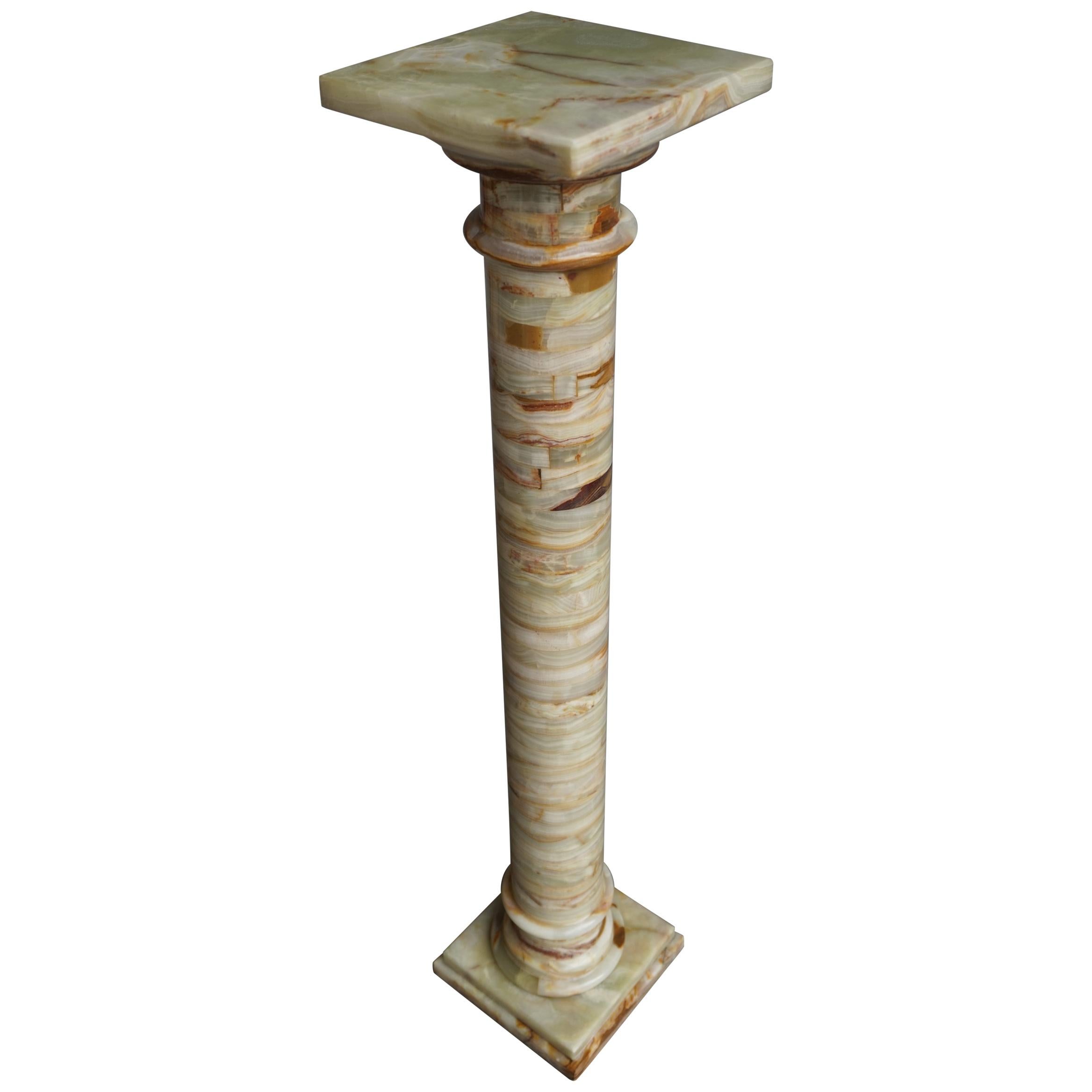 Stylish, colorful and top quality workmanship Italian column.

This classical Italian design stand is all handcrafted with nothing but solid onyx in the most beautiful colors. The timeless, Tuscan design makes this vintage stand suitable for all