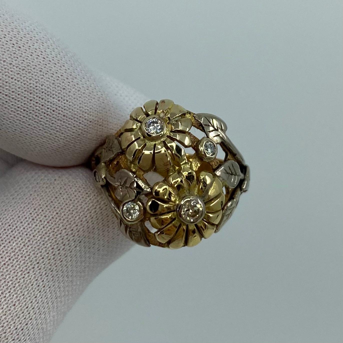 Handmade Summertime Flower 18 Karat Gold Art Nouveau Style Ring.

This is a beautiful handmade ring with a unique Autumnal 'art nouveau' design.
The ring is totally handmade in 18k yellow, white and rose gold.
It is set with 6 diamonds as centre
