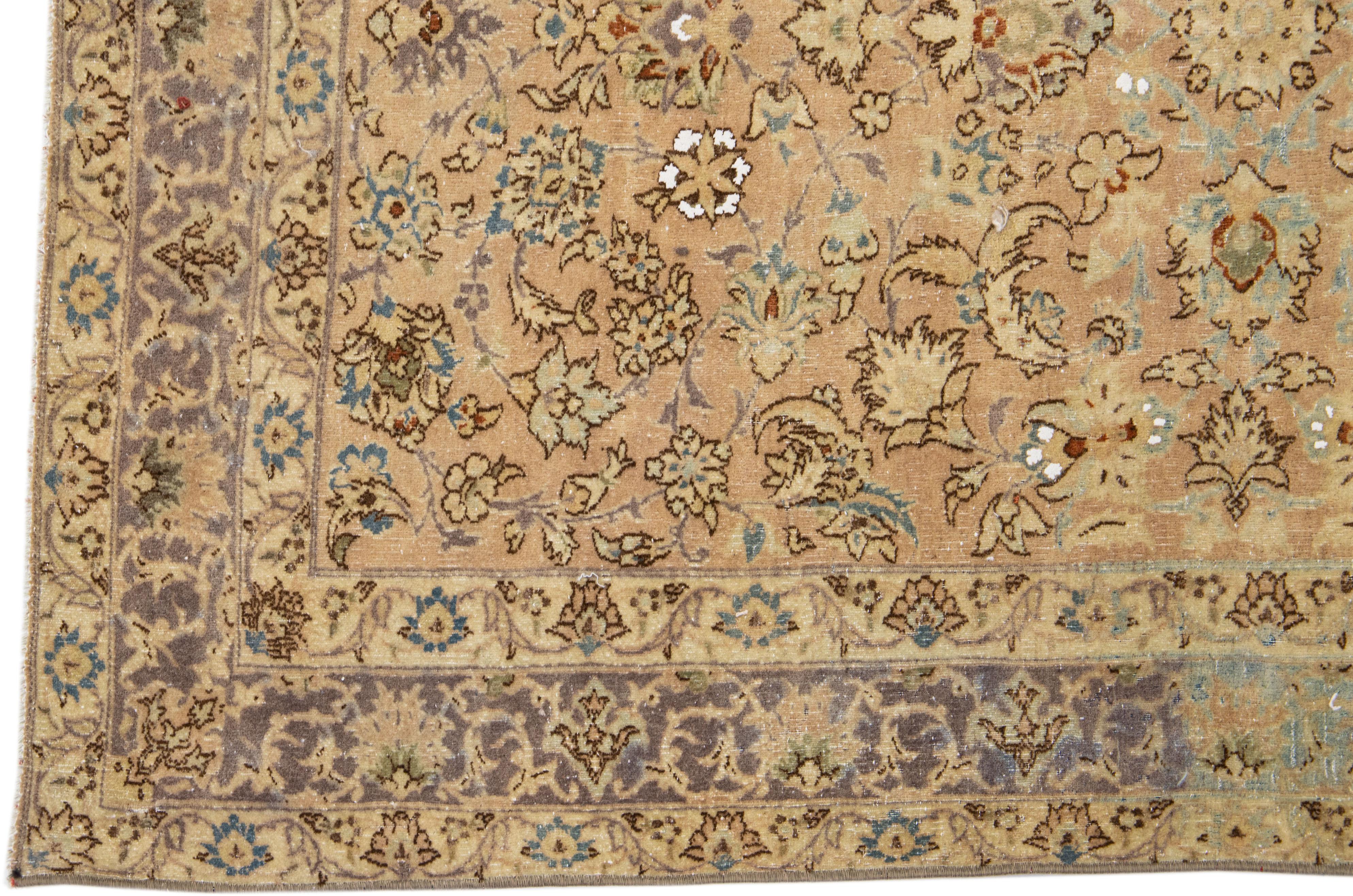 Handmade Tan Antique Persian Kirman Wool Rug with Allover Floral Motif In Excellent Condition For Sale In Norwalk, CT