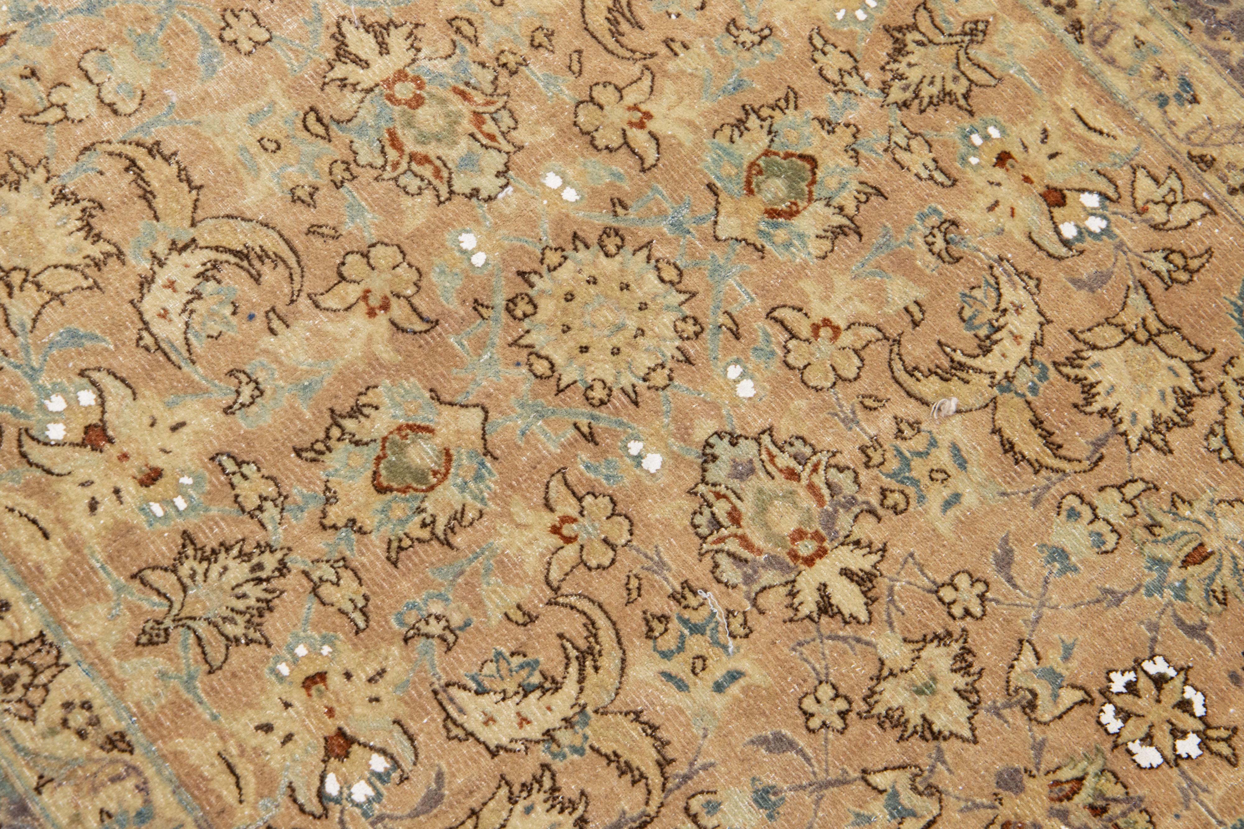 20th Century Handmade Tan Antique Persian Kirman Wool Rug with Allover Floral Motif For Sale