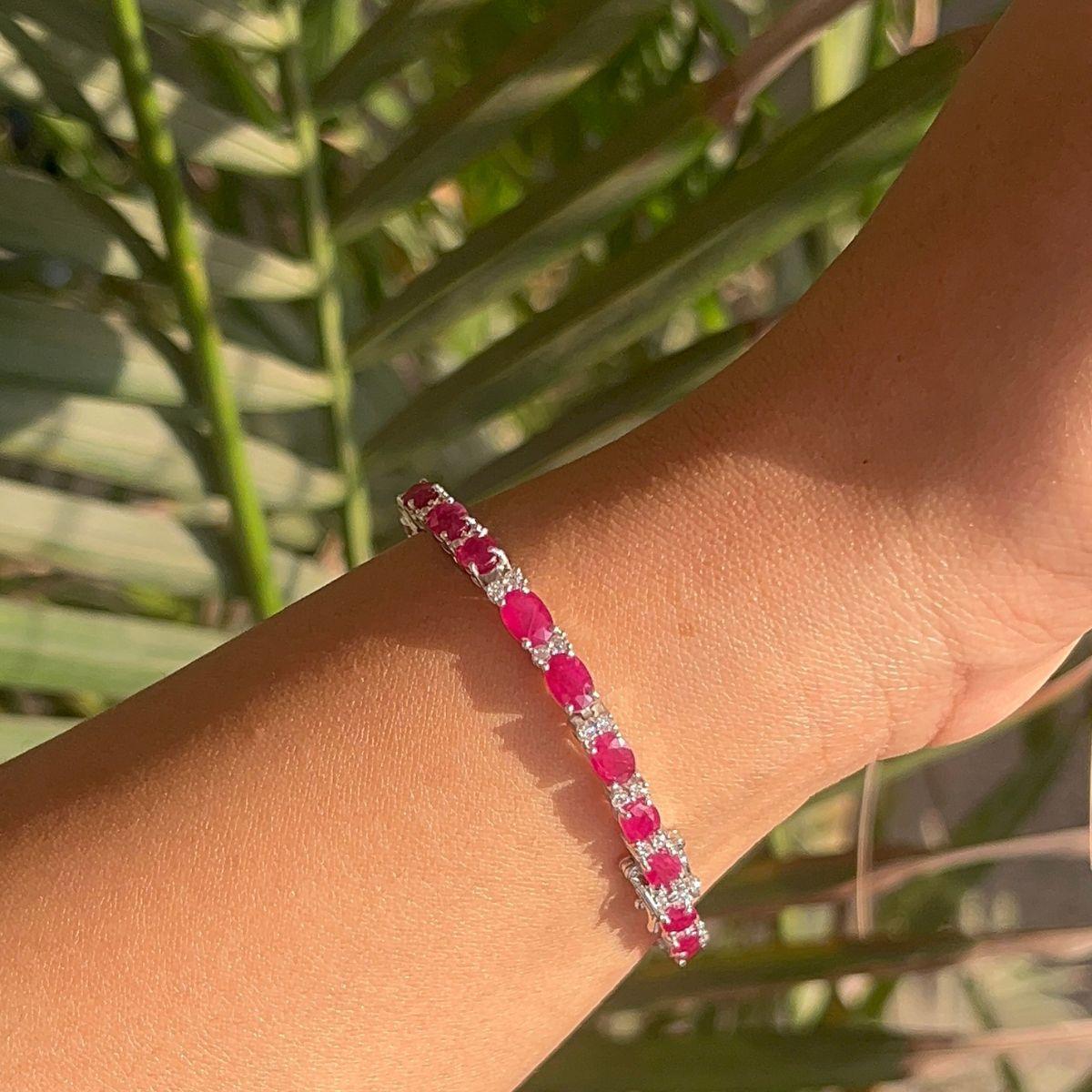 Vivid Gemstone Pink Ruby with Zirconia Birthstone Tennis Bracelet in sterling silver. You shall need statement tennis bracelet to make a statement with your look. Each piece features dazzling cubic zirconia stones, renowned for their brilliance and