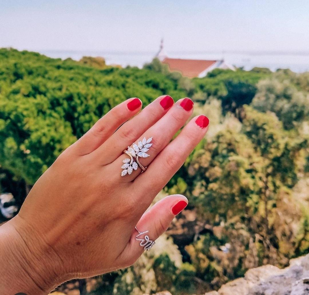 One of the kind design! All stones were carefully picked to have a nice graduation. 8 marquise-cut diamonds with small pave diamonds G-H colors VS-SI. 18k white gold. Stamped DLS. This ring is very comfortable to wear, doesn't catch on anything