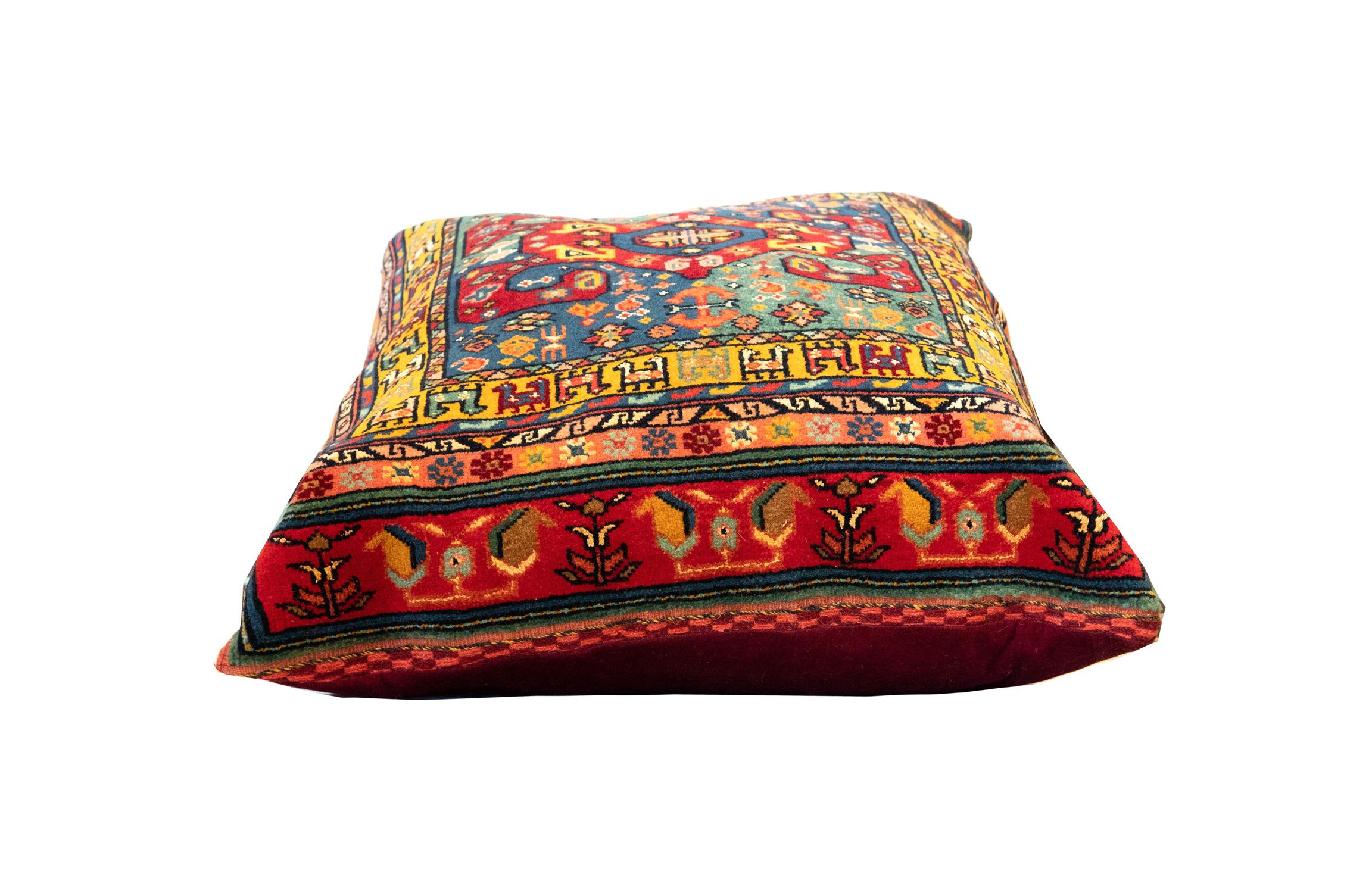 This fantastic floor cushion features a highly detailed geometric design. Hand-knotted with wool, which has been dyed using traditional vegetable dyeing techniques. Decorate your bed, sofa or floor with this fantastic piece as a scatter cushion. Mix