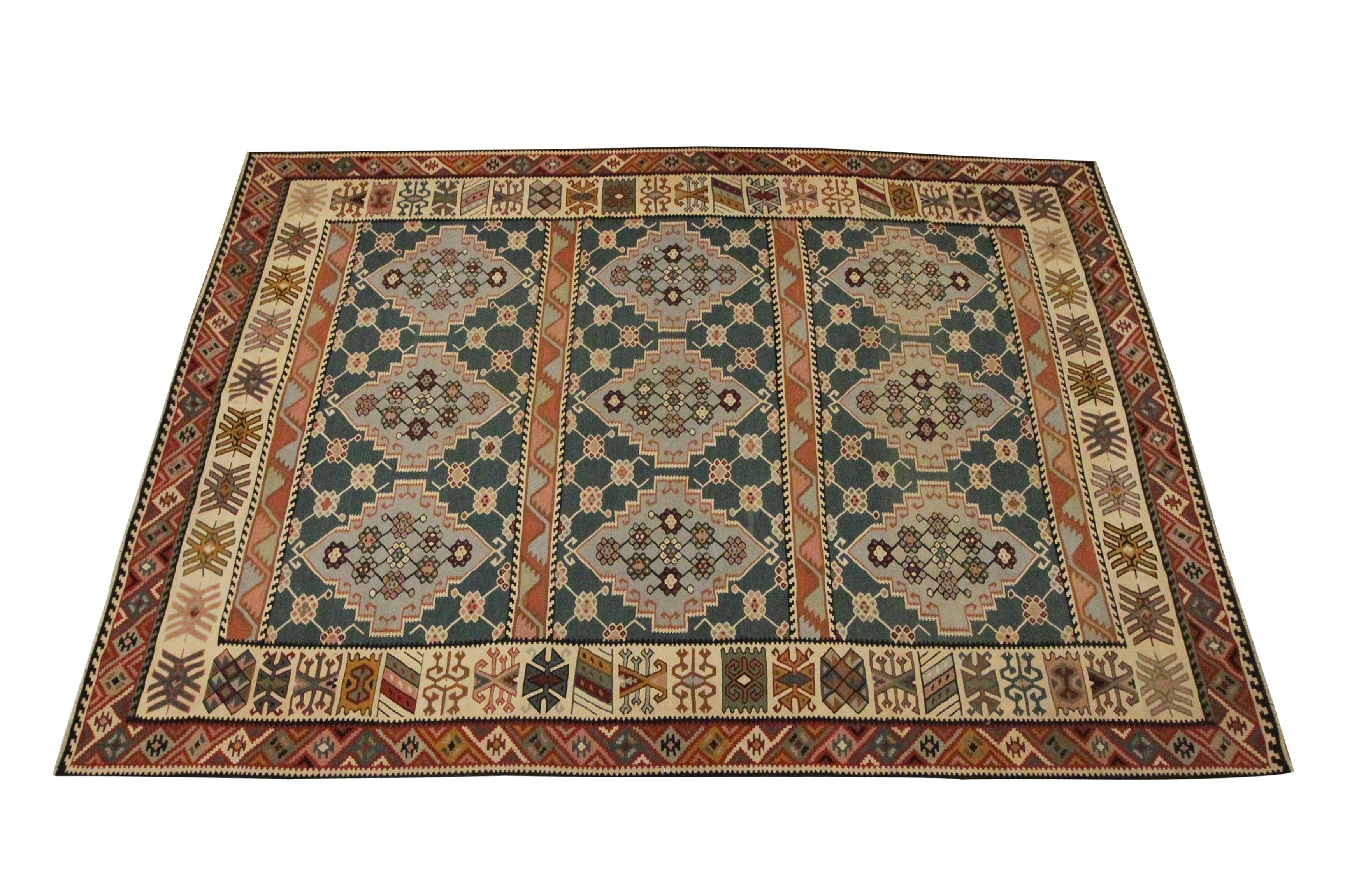 Looking for a new accessory to uplift your home, this antique kilim could be the perfect piece. The central design features a repeat tribal motif pattern woven with a beautiful colour palette. Bold and beautiful with accents of beige, rust, blue and