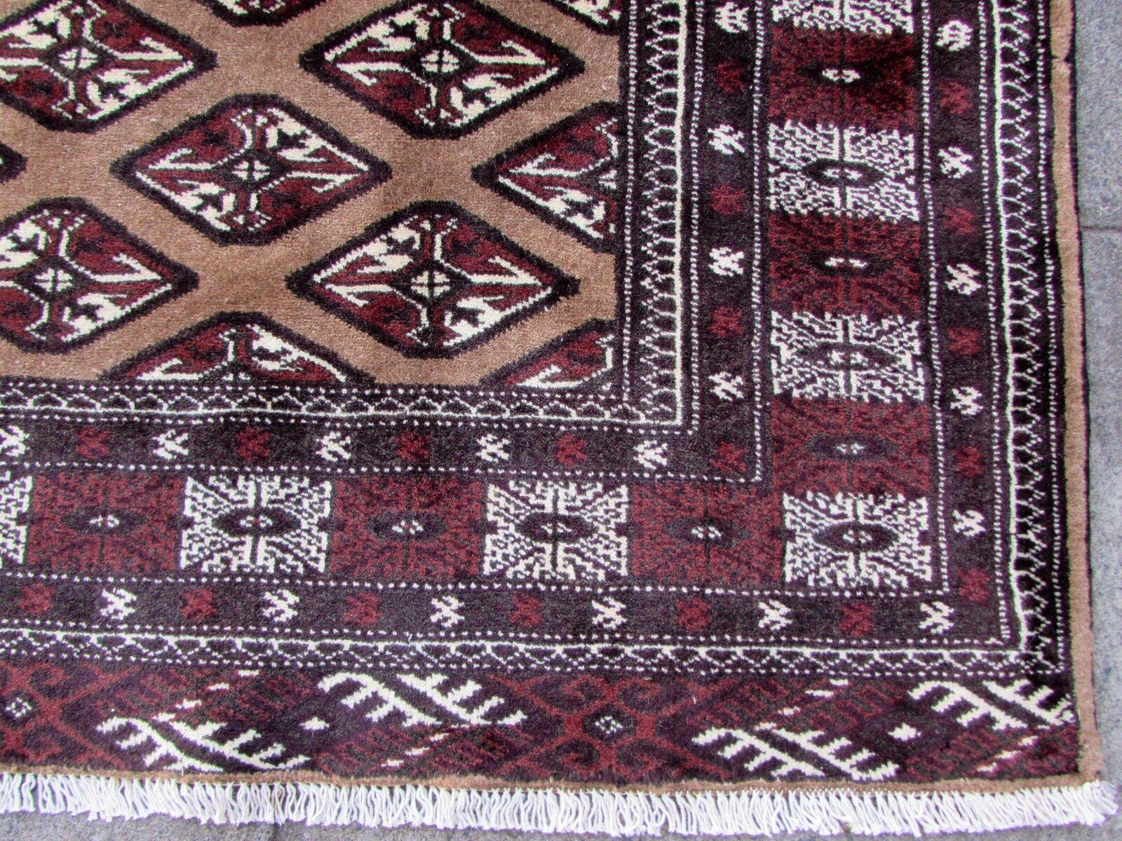 Handmade vintage rug from Afghanistan in geometric pattern. The rug is from the end of 20th century in original good condition

- Condition: Original good,

- circa 1970s,

- Size: 5' x 8.1' (149cm x 243cm),

- Material: Wool,

- Country