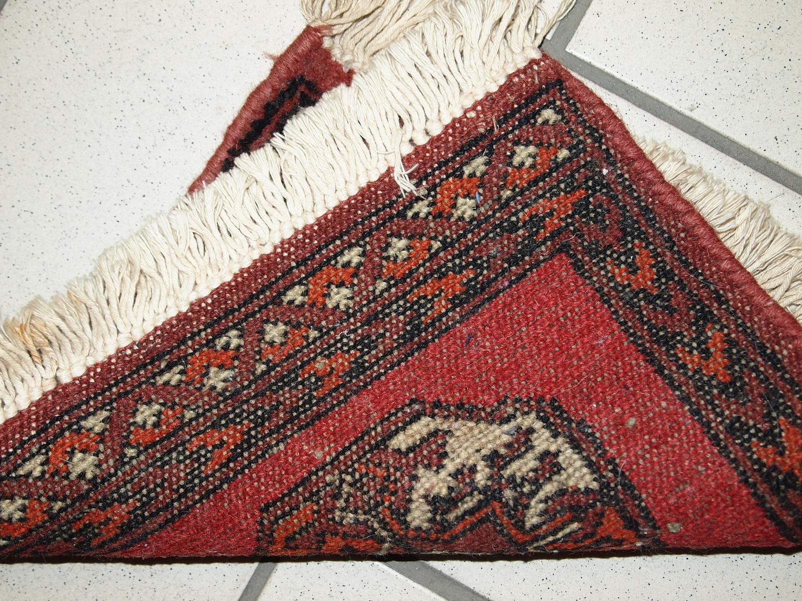 Vintage handmade Ersari mat from Afghanistan. It is in original good condition, has been made in the end of 20th century.

- Condition: original good,

- circa 1970s,

- Size: 0.9' x 1' (27cm x 31cm),

- Material: wool,

- Country of