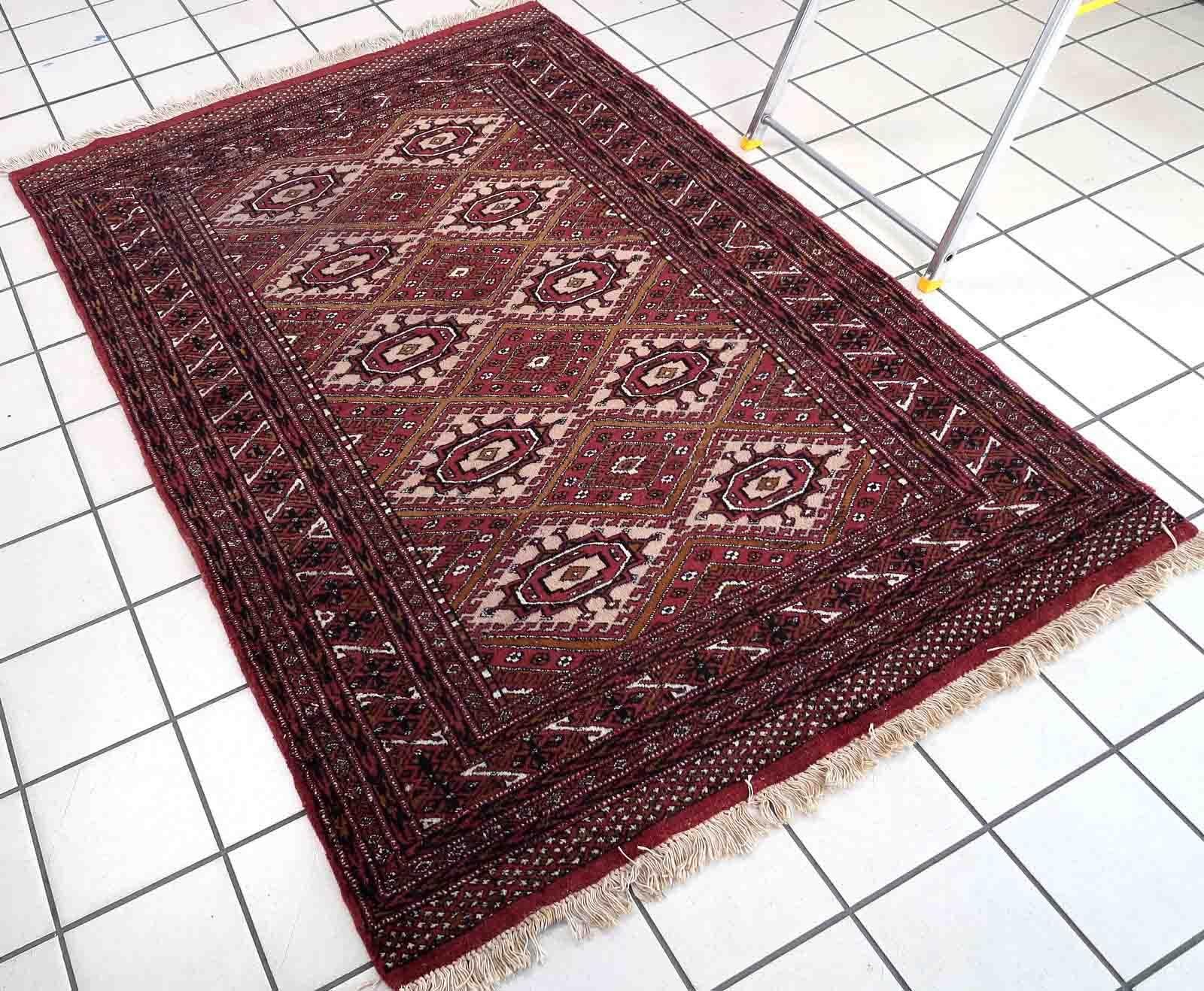 Handmade vintage Afghan Ersari rug in original good condition. The rug has been made in wool in the end of 20th century.

-Condition: original good,

-circa: 1970s,

-Size: 4' x 6' (123cm x 183cm),

-Material: wool,

-Country of origin: