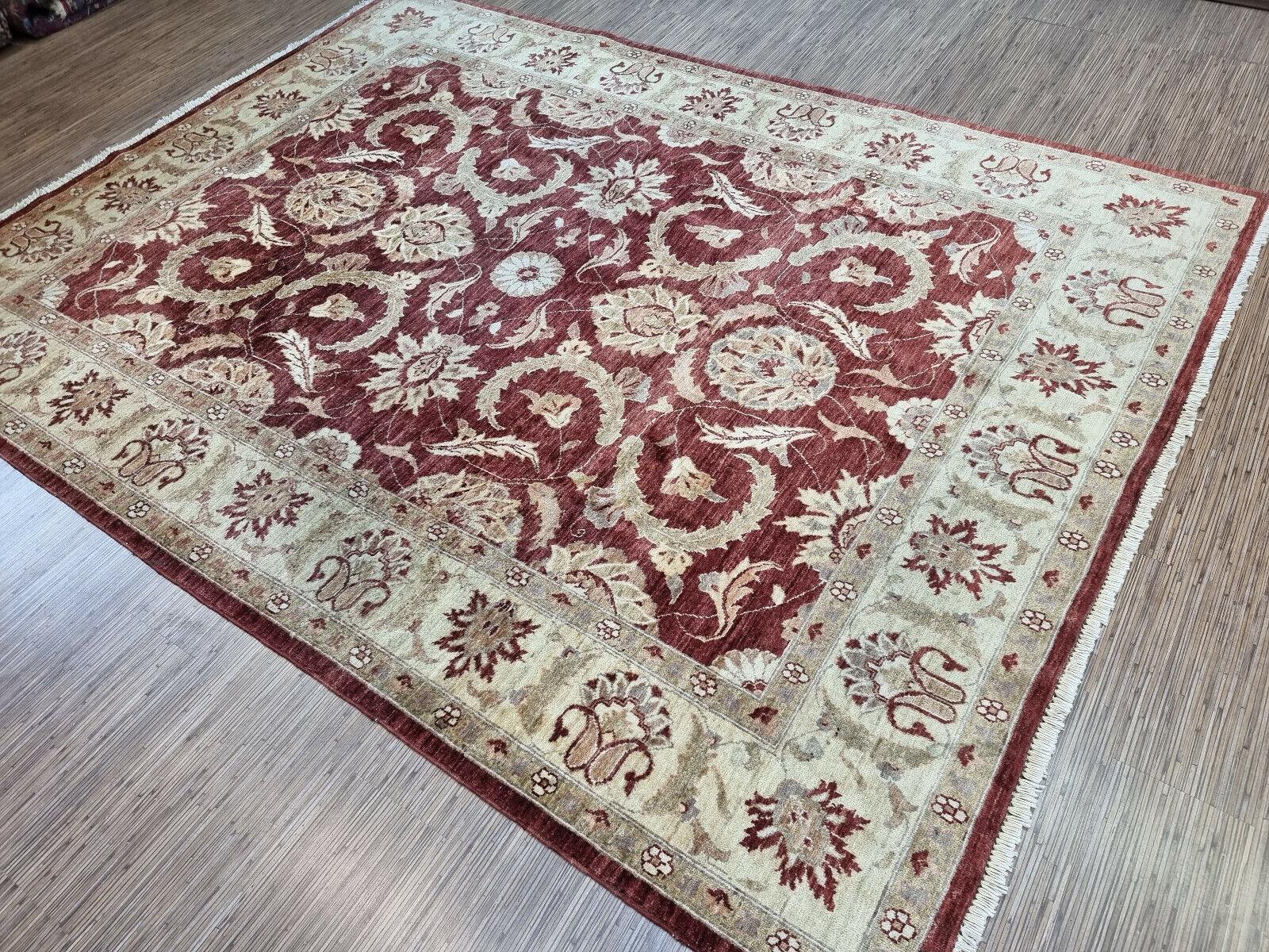 Handmade Vintage Afghan Zigler Rug

Bring home a piece of history and artistry with this handmade vintage Afghan Zigler rug. This stunning piece measures 6.7’ x 9’ and was crafted in the 1980s, but is still in good condition and ready to beautify