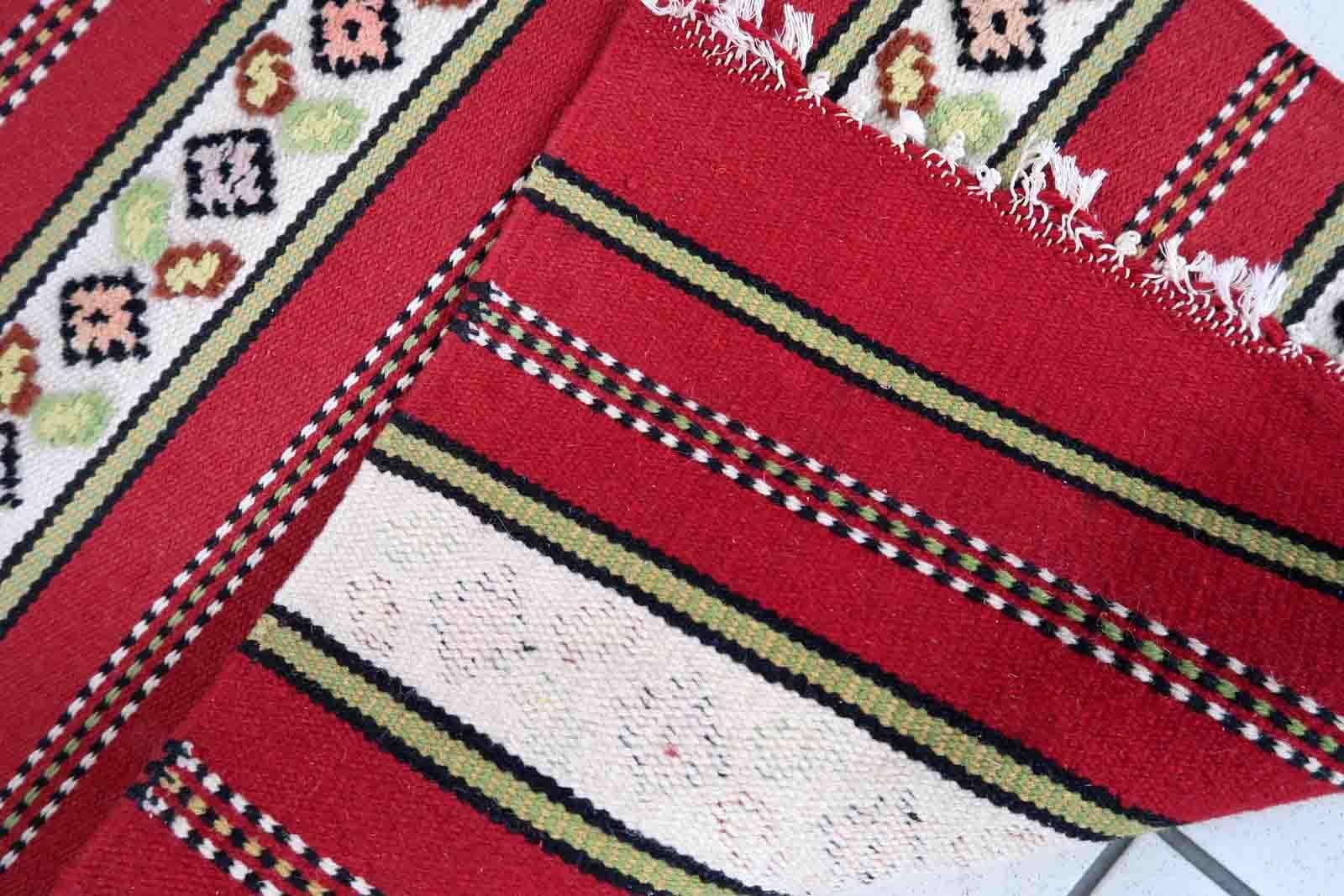 Handmade vintage Ardabil narrow runner in red and white stripes. The rug is from the end of 20th century in original good condition. 

?-condition: original good,

-circa: 1970s,

-size: 2' x 6.5' (61cm x 201cm),

-material: