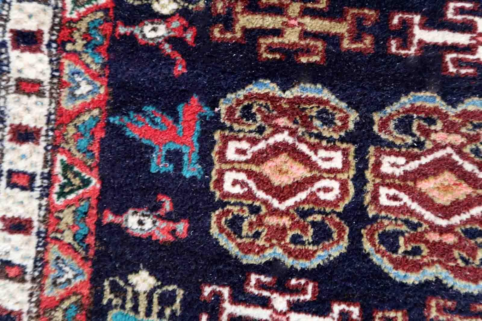 Handmade vintage Erevan rug from Armenia in navy blue color. The rug is from the end of 20th century in original good condition.

-condition: original good,

-circa: 1960s,

-size: 5.5' x 8.8' (169cm x 269cm),

-material: wool,

-country