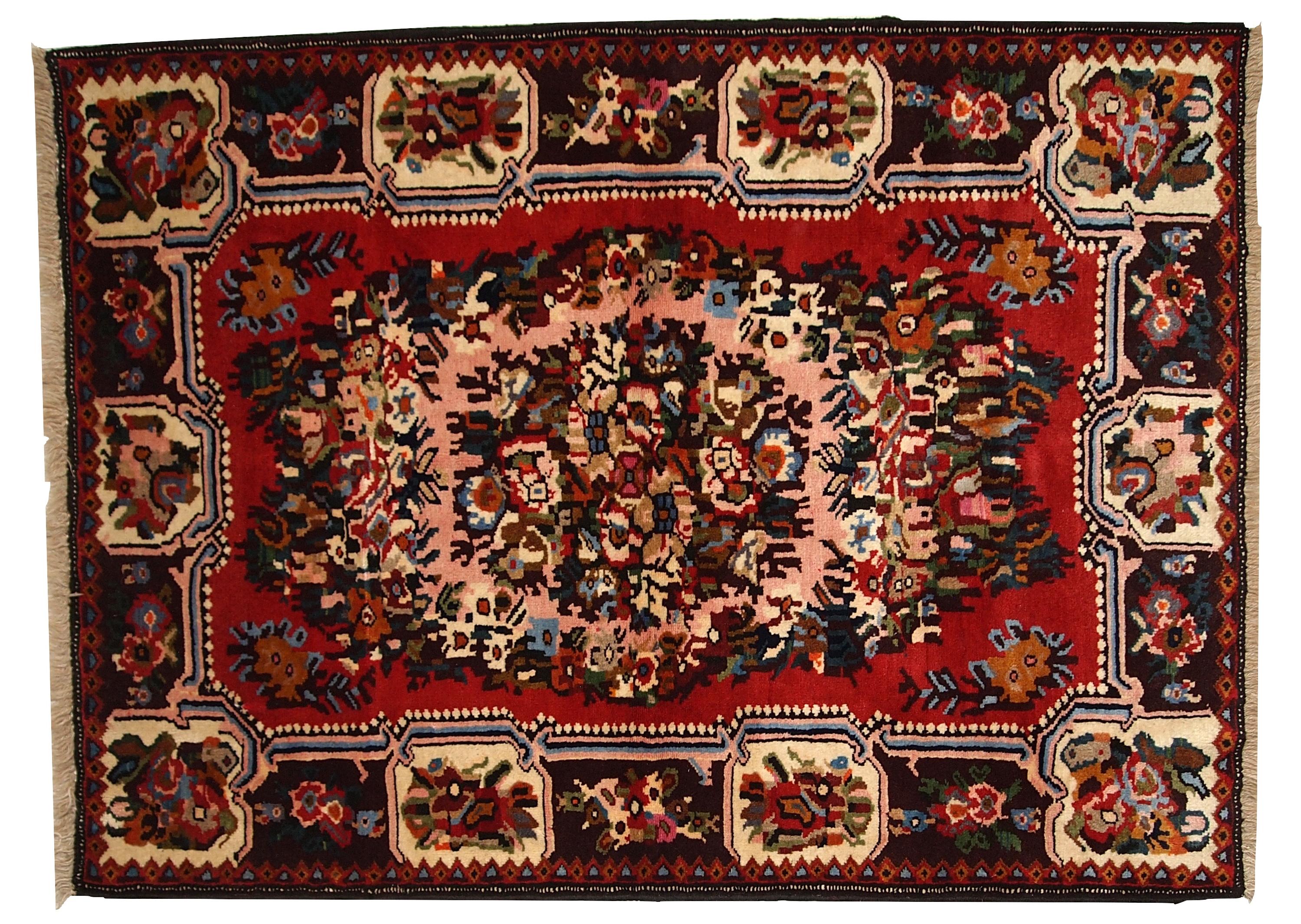 Handmade vintage Bakhtiari rug in original good condition. Full pile and great original condition. There no stains, tears or holes on the rug.
 
 