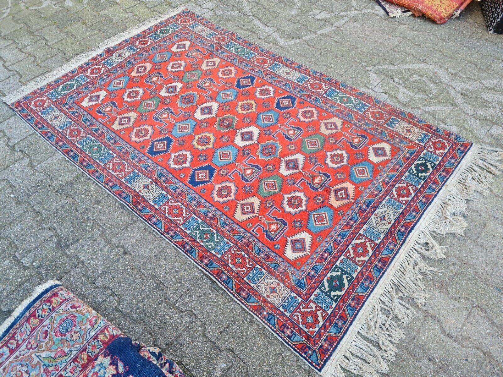 Alfombra kazaka vintage hecha a mano 4,4' x 6,7' años 80 - 2K31 Anudado a mano en venta