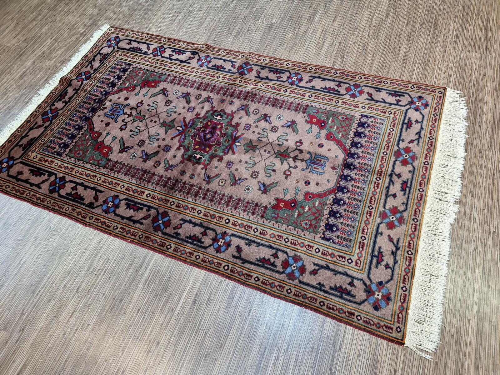 Handmade Vintage Caucasian Shirvan Rug

Enhance your home with this handmade vintage Caucasian Shirvan rug, a piece that combines history and artistry. This stunning piece measures 4’ x 6.6’ or 124cm x 204cm, making it a medium-sized rug suitable