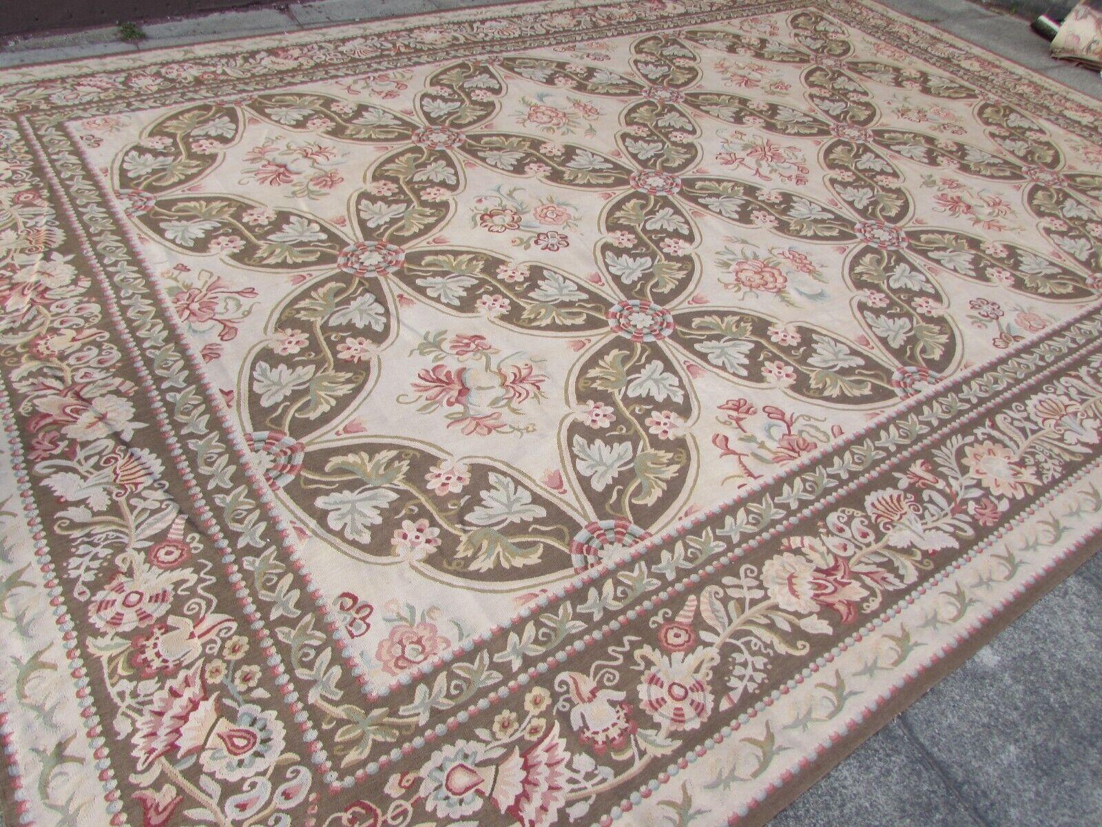 Elevate your living space with the timeless elegance of this Vintage 1970s Handmade French Aubusson Flatweave Rug. This masterpiece, measuring 9.9' x 14.2' (302 x 433 cm), embodies the artistry of traditional French design.

Key Details:

Origin: