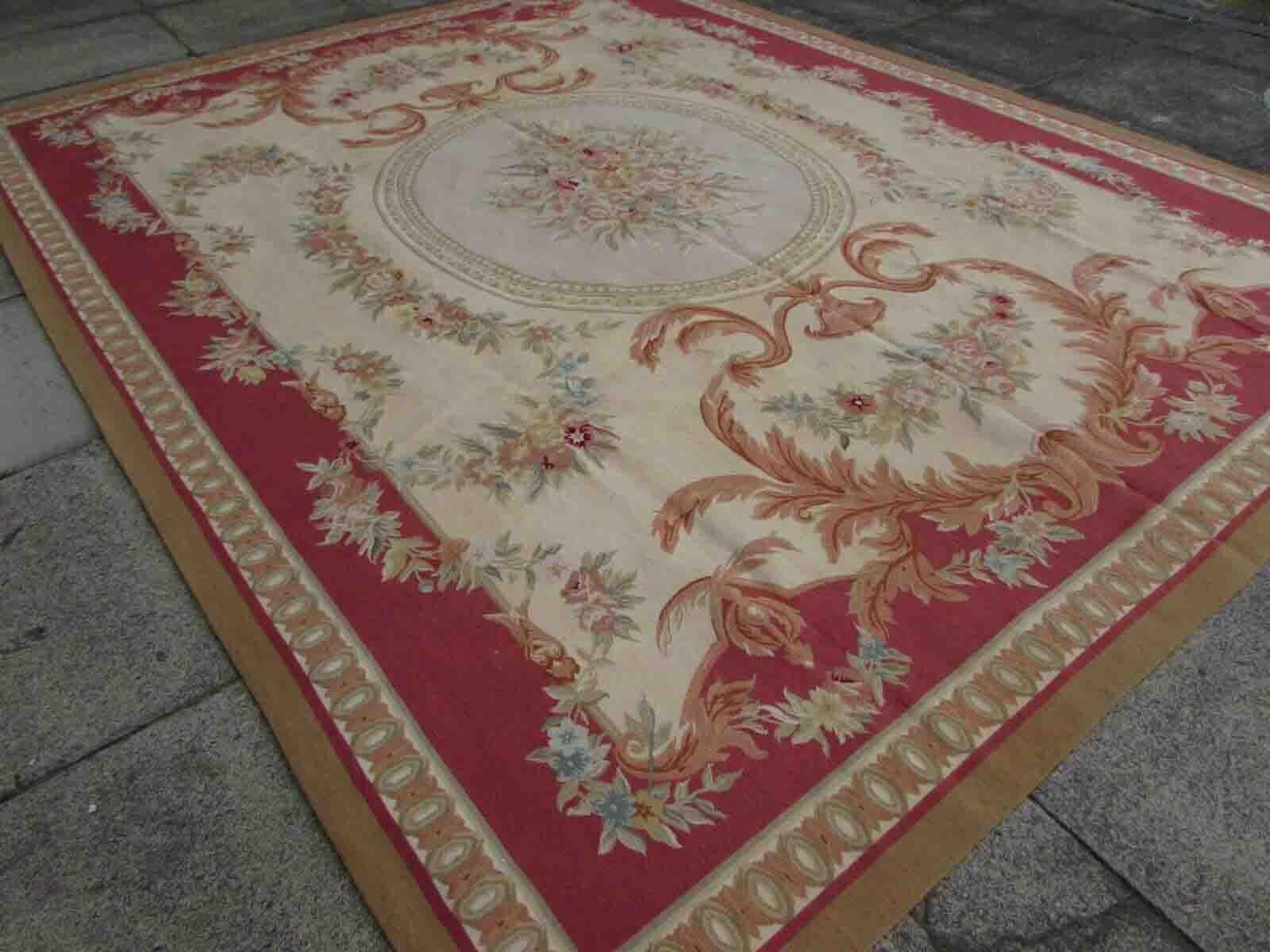Handmade vintage French Aubusson rug in traditional design. The rug is from the end of 20th century in original good condition.

-condition: original good, 

-circa: 1970s,

-size: 7.9' x 10' (243cm x 306cm),

-material: wool,

-country of