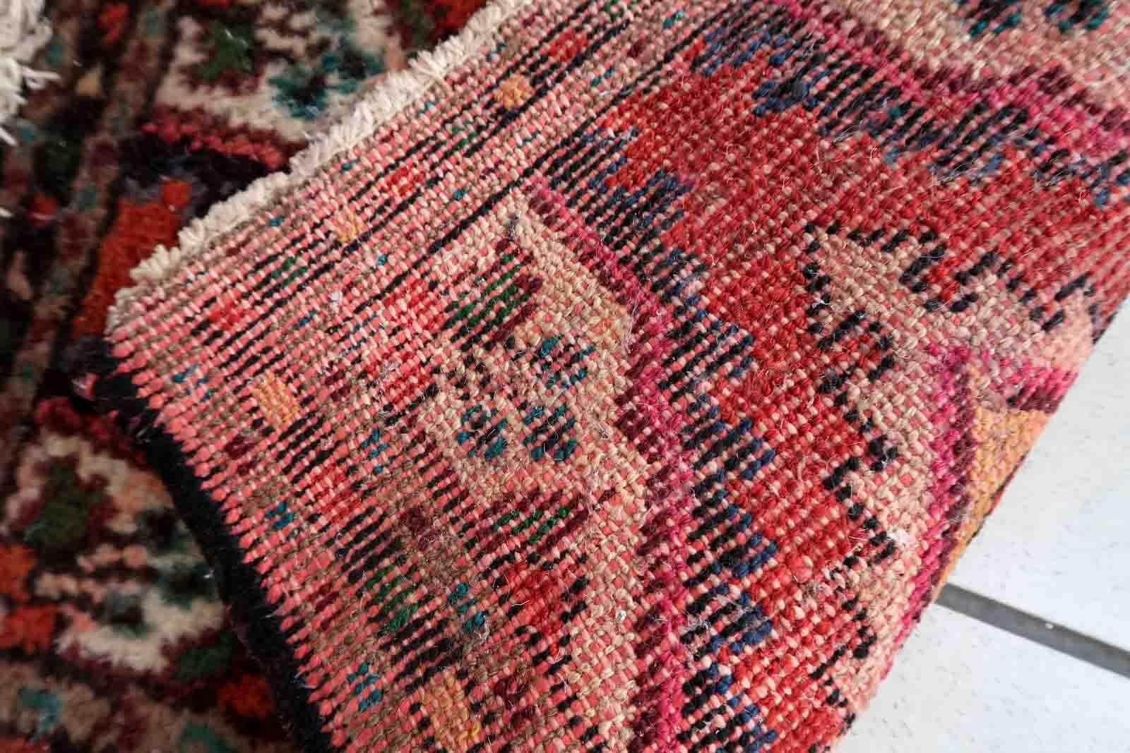 Handmade vintage Middle Eastern rug in traditional medallion design. The rug has been made in wool in the end of 20th century. It is in original good condition.

-condition: original good,

-circa: 1970s,

-size: 1.1' x 1.7' (35cm x