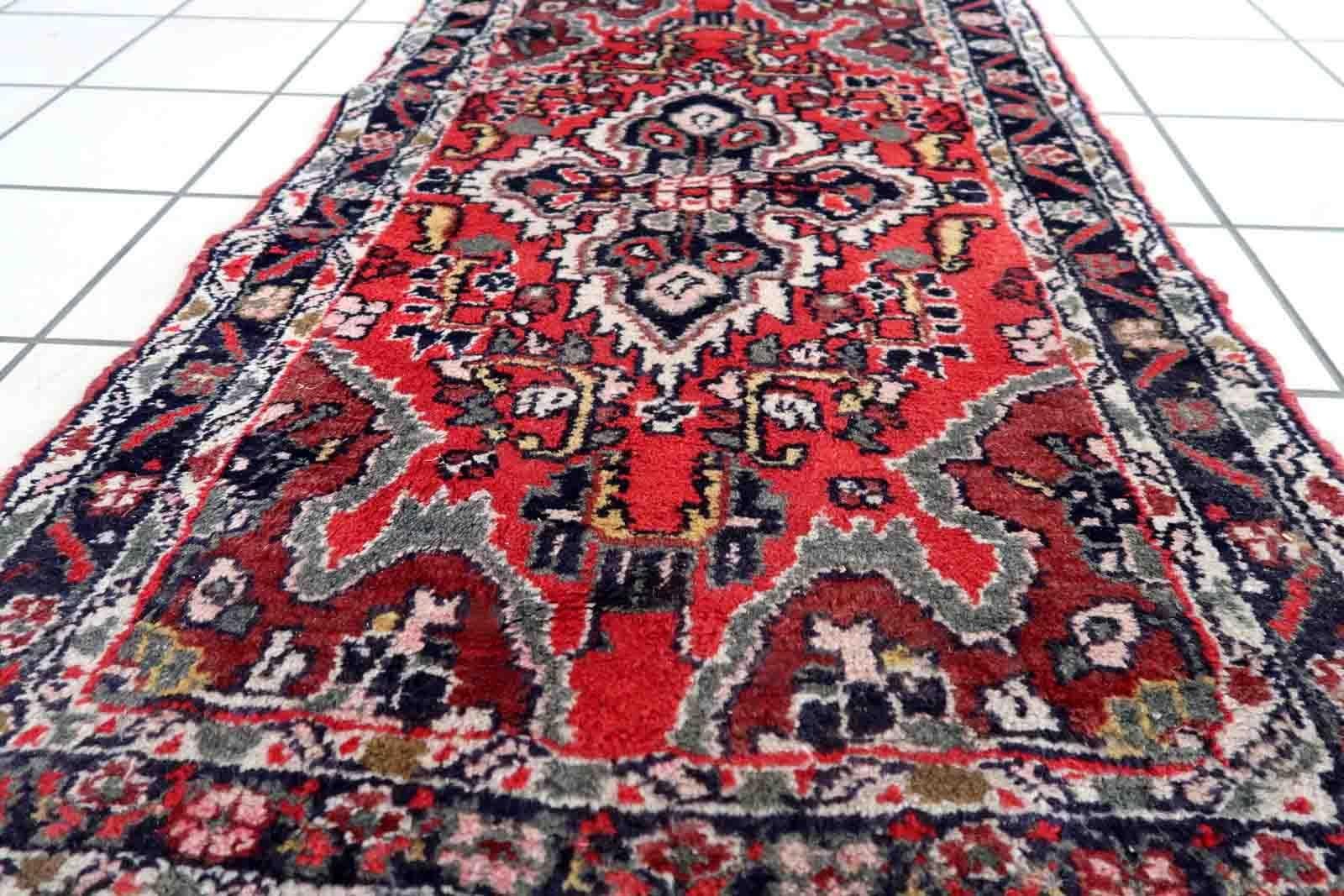 Handmade vintage Middle Eastern rug in traditional medallion design. The rug has been made in wool in the end of 20th century. It is in original good condition.

-condition: original good,

-circa: 1970s,

-size: 2.1' x 3.6' (67cm x