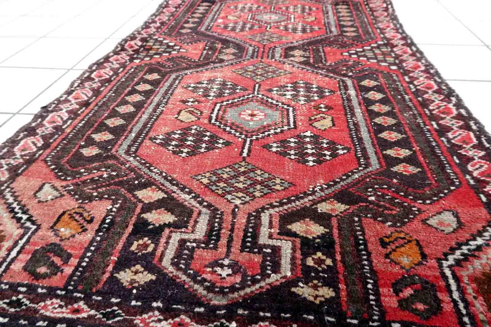 Handmade vintage Persian Hamadan rug in pale red and brown colors. The rug is from the middle of 20th century in original condition, it has some signs of age.

-condition: original, some signs of age,

-circa: 1950s,

-size: 2.5' x 4.2' (78cm