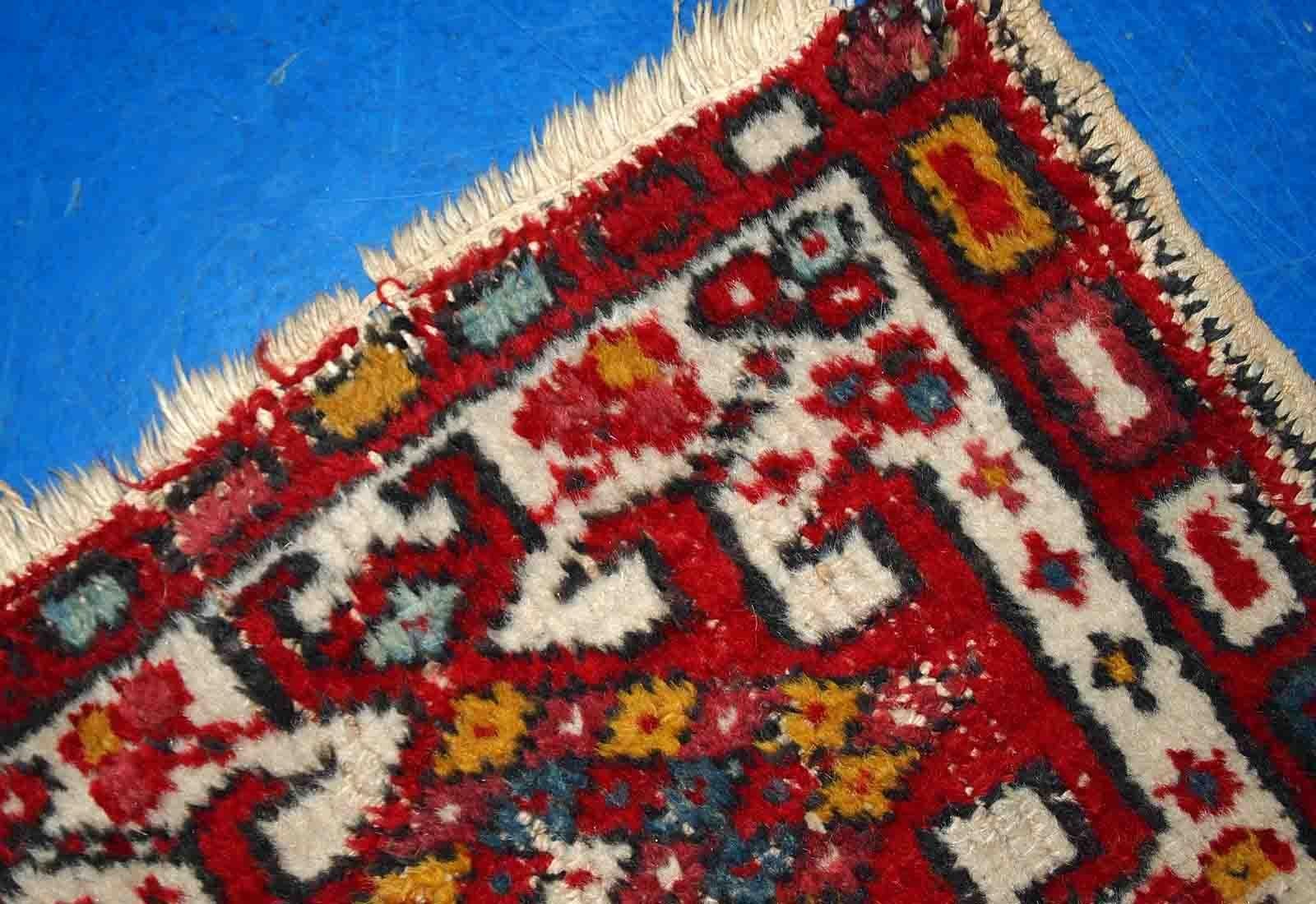 Vintage handmade Middle Eastern Hamadan mat in original condition, it has some age wear. The rug is from the end of 20th century in red and white colours.

-condition: original, some age wear,
?
-circa: 1970s,

-size: 1.7' x 2.4' (51cm x