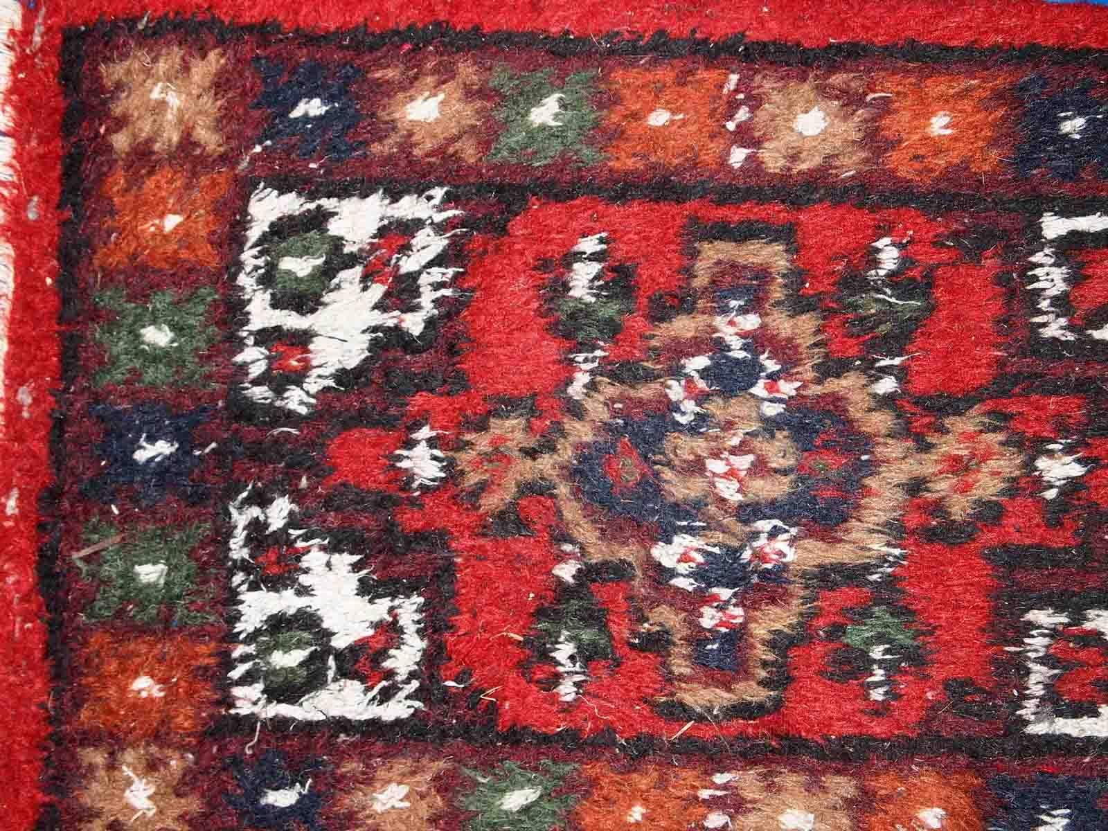 Vintage handmade Middle Eastern mat in original good condition. The rug is from the end of 20th century.

-condition: original good, 

-circa: 1970s,

-size: 1.3' x 1.9' (41cm x 59cm),

-material: wool,

-country of origin: Middle