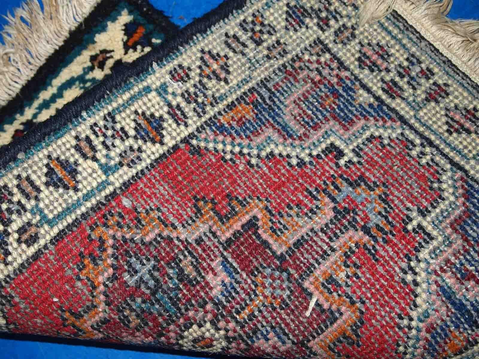 Vintage handmade Middle Eastern mat in original good condition. The rug is from the end of 20th century.

-condition: original good, 

-circa: 1970s,

-size: 1.3' x 1.9' (40cm x 60cm),

-material: wool,

-country of origin: Middle