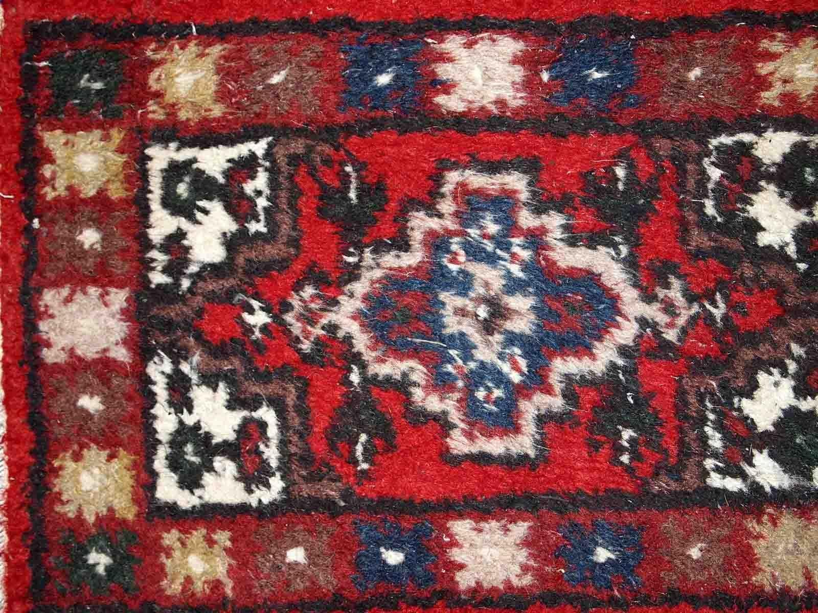 Vintage handmade Middle Eastern mat in original good condition. The rug is from the end of 20th century.

-condition: original good, 

-circa: 1970s,

-size: 1.3' x 1.9' (40cm x 59cm),

-material: wool,

-country of origin: Middle