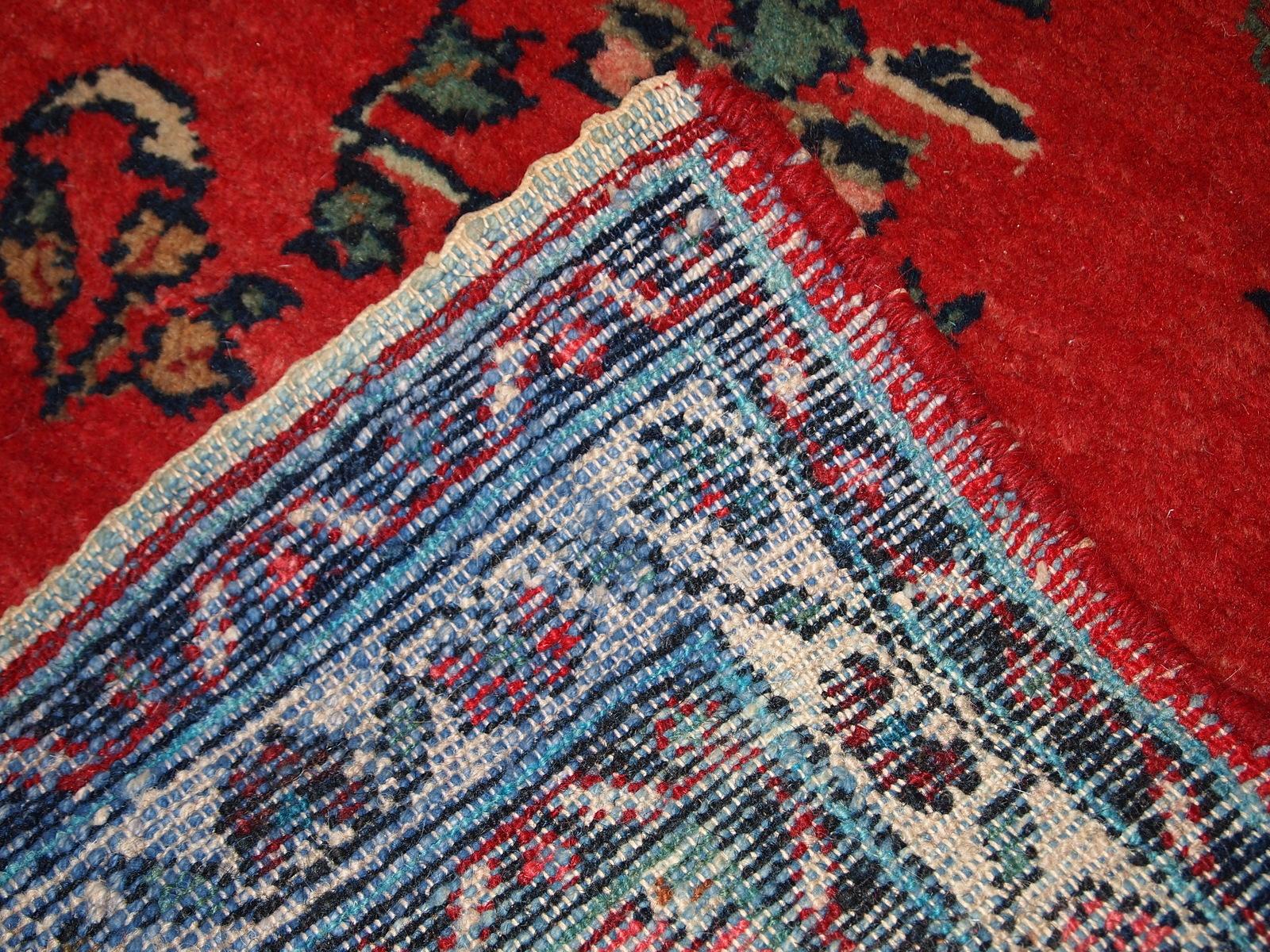 Handmade vintage Hamadan runner in red wool. This rug has been made in the middle of 20th century in Middle East region.

-condition: original good,

-circa 1960s,

-size: 2.6' x 6.3' (81cm x 194cm),

-material: wool,

-country of origin: