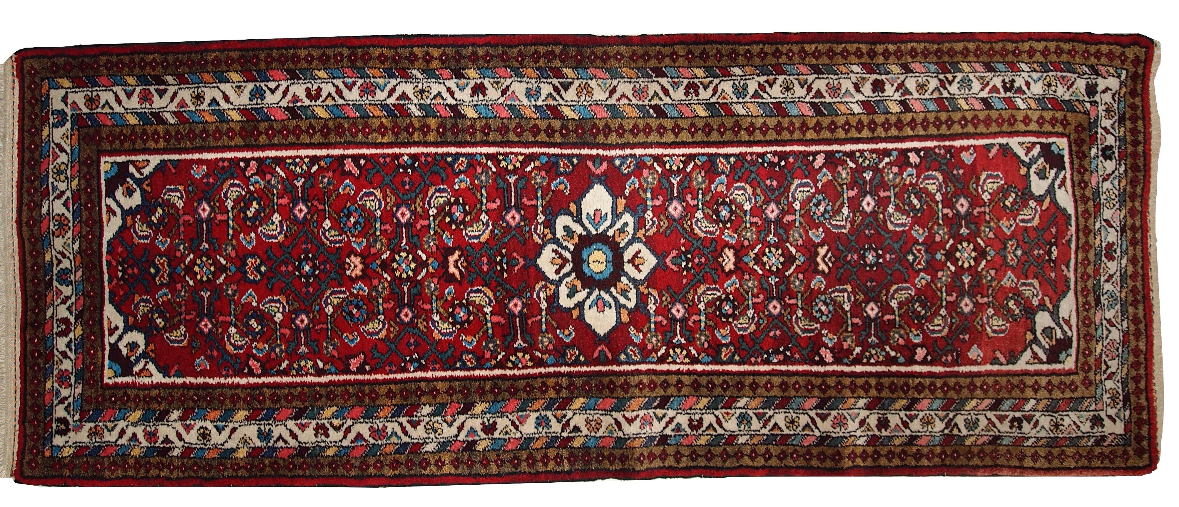 Vintage Persian Hamadan runner in original good condition and in red shade. The rug is thick with the full pile of soft wool.

 
