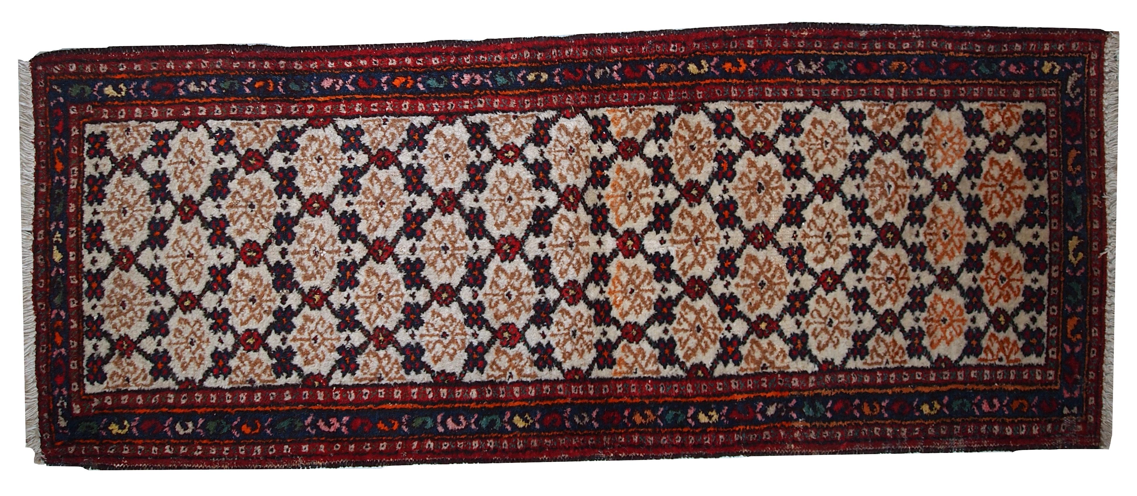 Antique Hamadan runner in good original condition. The rug is in white, red and blue shades. Measures: 2.6' x 6.8' (80 cm x 207 cm).