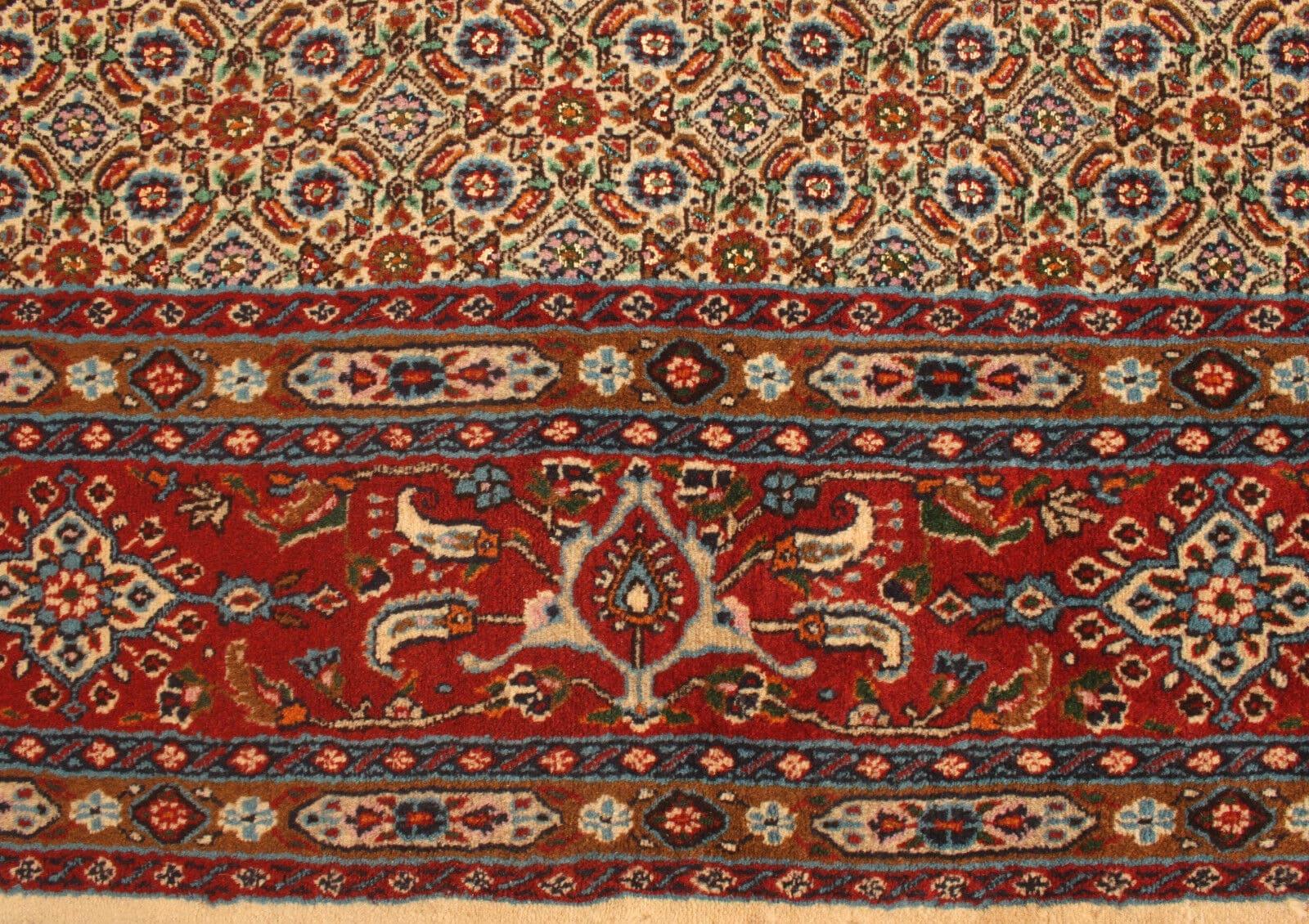 Handmade Vintage Indian Mahal Rug (6.3’ x 9.8’)

Discover the charm of traditional craftsmanship with our Handmade Vintage Indian Mahal Rug from the 1970s. This woolen treasure, measuring 6.3’ x 9.8’, is a splendid representation of the Persian