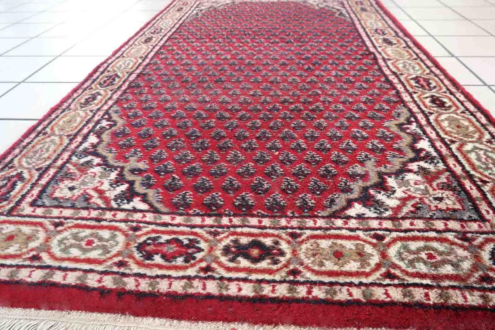 Handmade vintage Indian Seraband rug in traditional all-over design. The rug is form the end of 20th century in original good condition.

-condition: original good,

-circa: 1970s,

-size: 3' x 5.3' (94cm x 163cm),

-material: